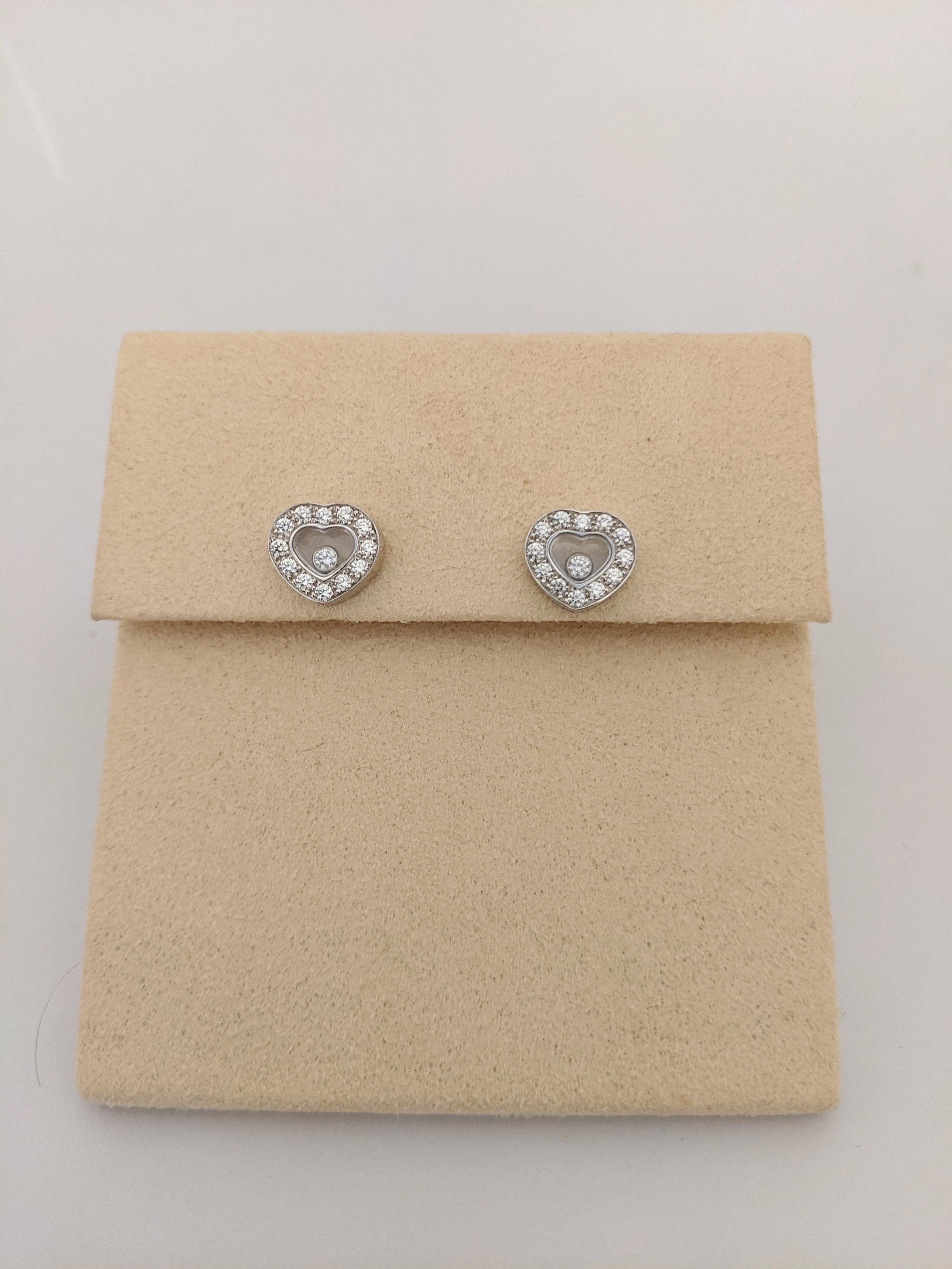 Modern Chopard 18 Karat Gold Diamond Heart Stud Earrings with Single Floating Diamond For Sale