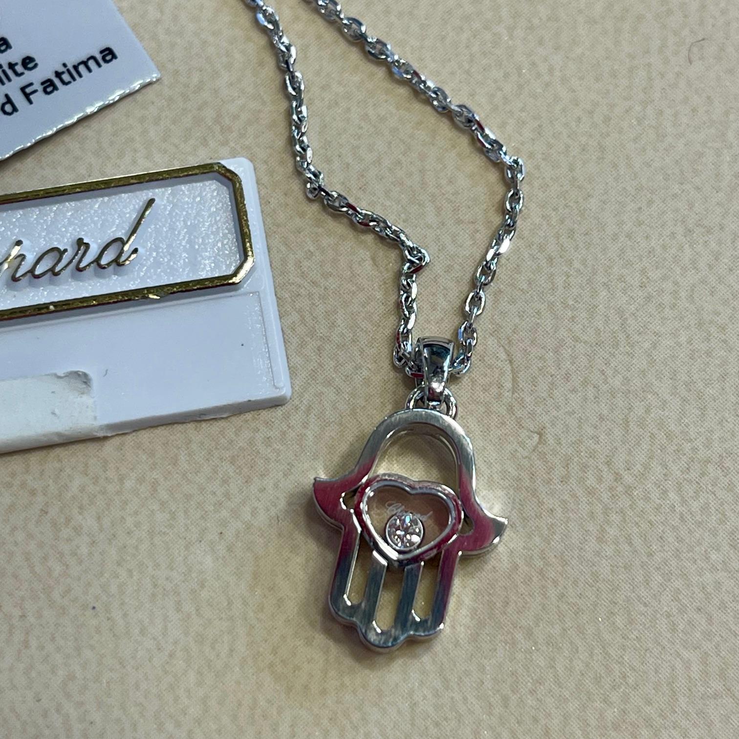 Chopard 18Kt. White Gold Hand Of Fatima Hamsa Pendant Necklace In New Condition For Sale In Miami, FL