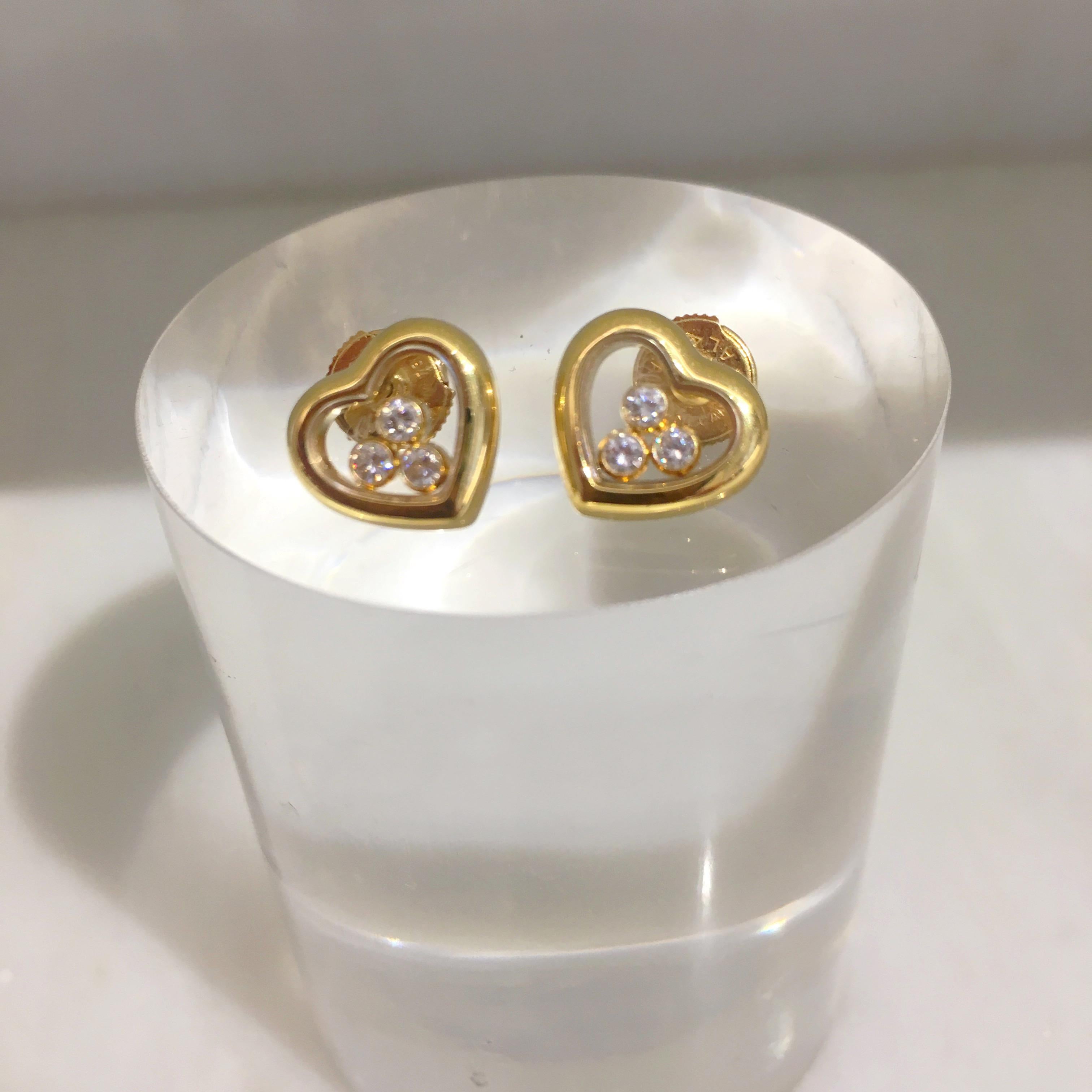 Modern Chopard 18 Karat Gold Happy Diamond Heart Earrings with 3 Floating Diamonds
