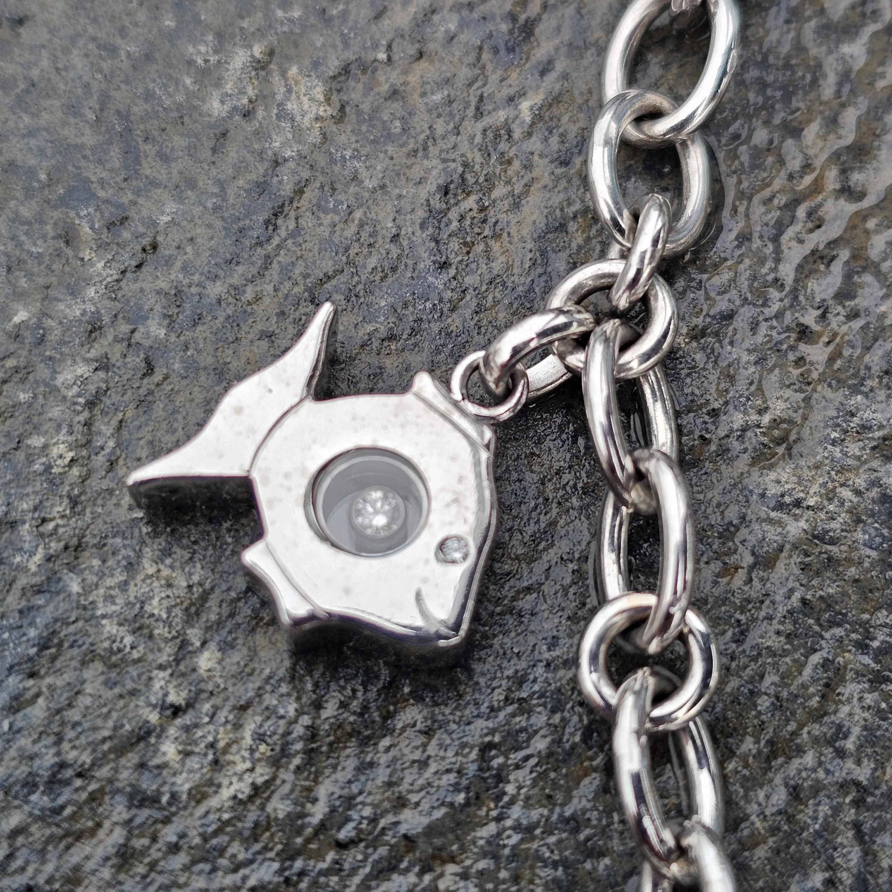 Chopard Bracelet à 4 breloques éléphant clown poisson heureux en or blanc 18 carats en vente 1