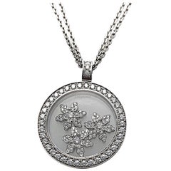 Chopard Pendentif à double chaîne en forme de flocons de neige avec diamants de 0,96 carat