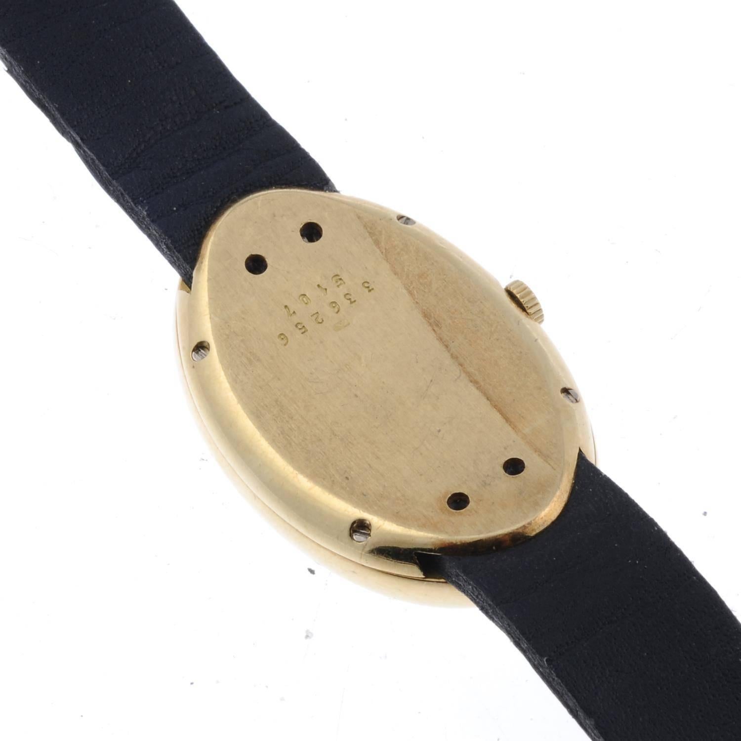 CHOPARD - a lady's wrist watch. Yellow gold case, stamped 750 with poincon. Numbered 336256 5107. Signed manual wind calibre 846. White dial with Roman numeral hour markers. Fitted to an unsigned blue crocodile strap with gold plated pin buckle. 22mm