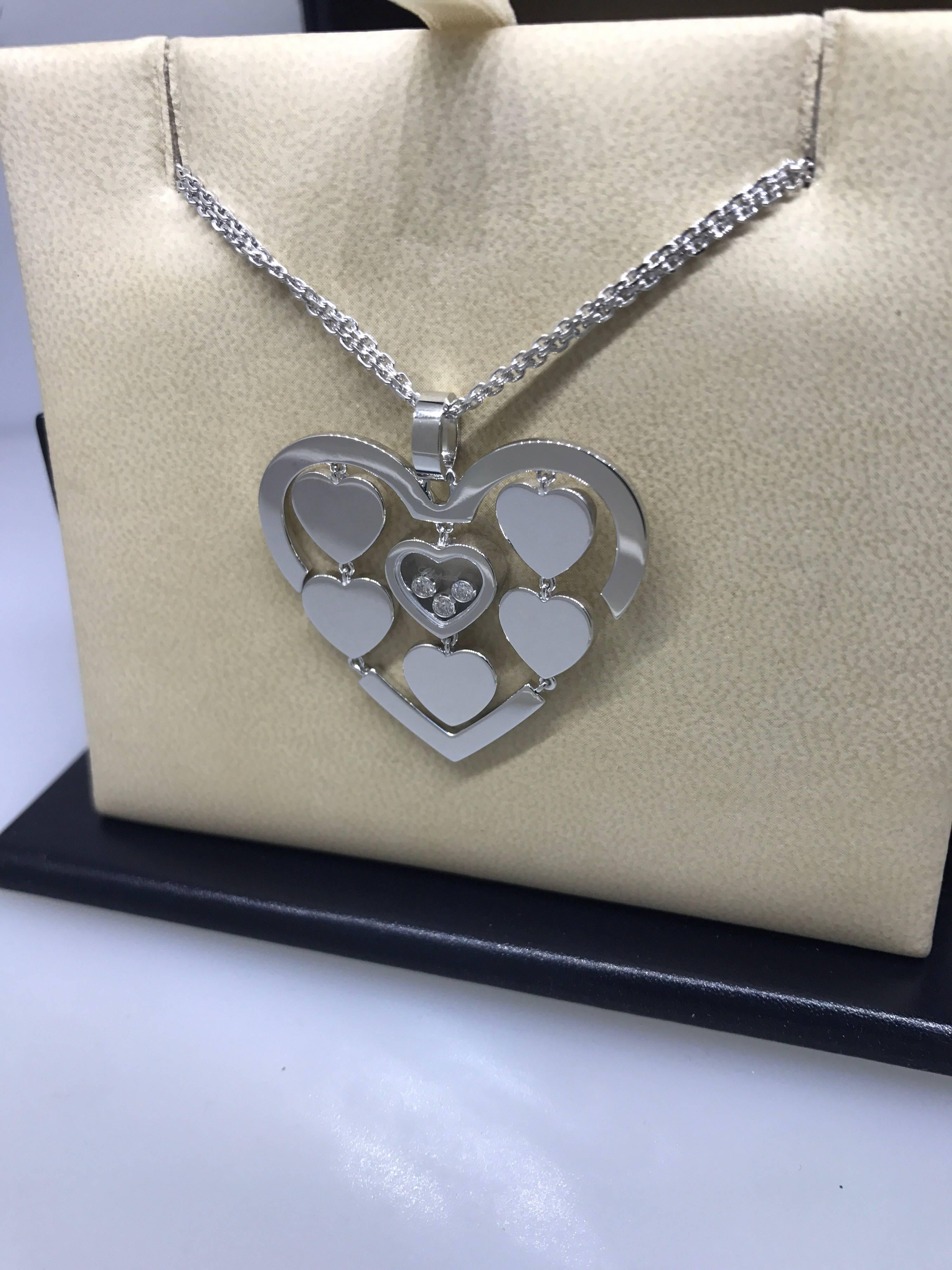 Chopard Amore Hearts Pendant Necklace

Model Number: 79/7220-1001

100% Authentic

Brand New

Comes with original Chopard box, certificate of authenticity and warranty, and jewels manual

18 Karat White Gold (24.60gr)

3 Floating Diamonds (.17