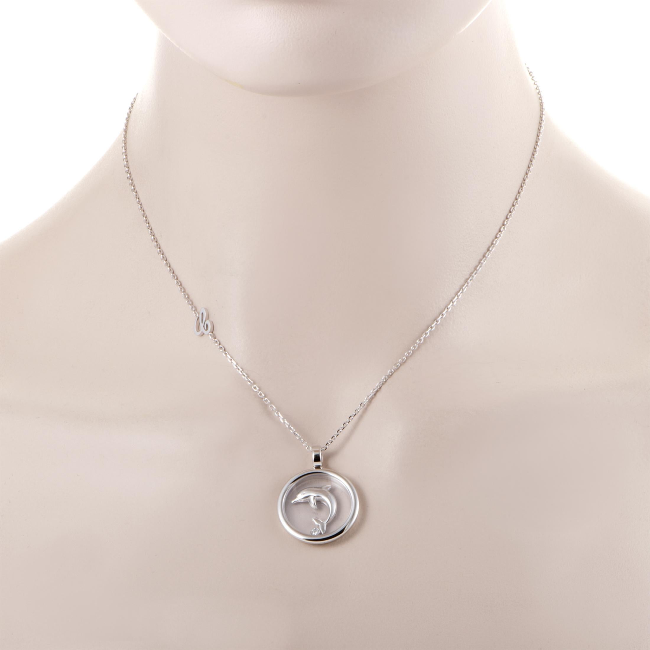 Animal World Dolphin 18K White gold pendant necklace - a fantastic sculpted dolphin in white gold jumps above a single floating diamond in a circle of white gold and is suspended from a beautiful white gold chain with the Chopard 