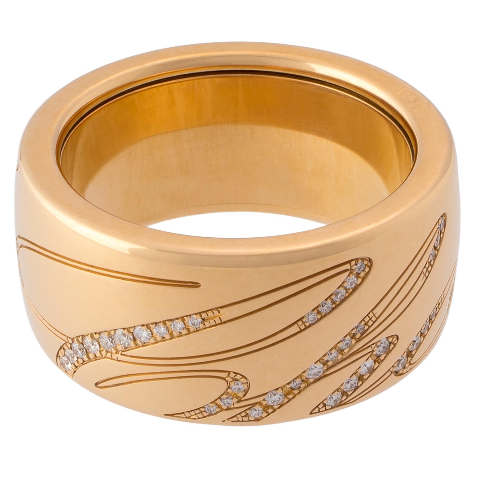 Chopard rose gold ring from the Chopardissimo collection, set with round brilliant cut diamonds in the shape of the word Chopard along the shank.
Shank width 11 mm (0.43 in)
Size: Swiss 17, French 57, US 8