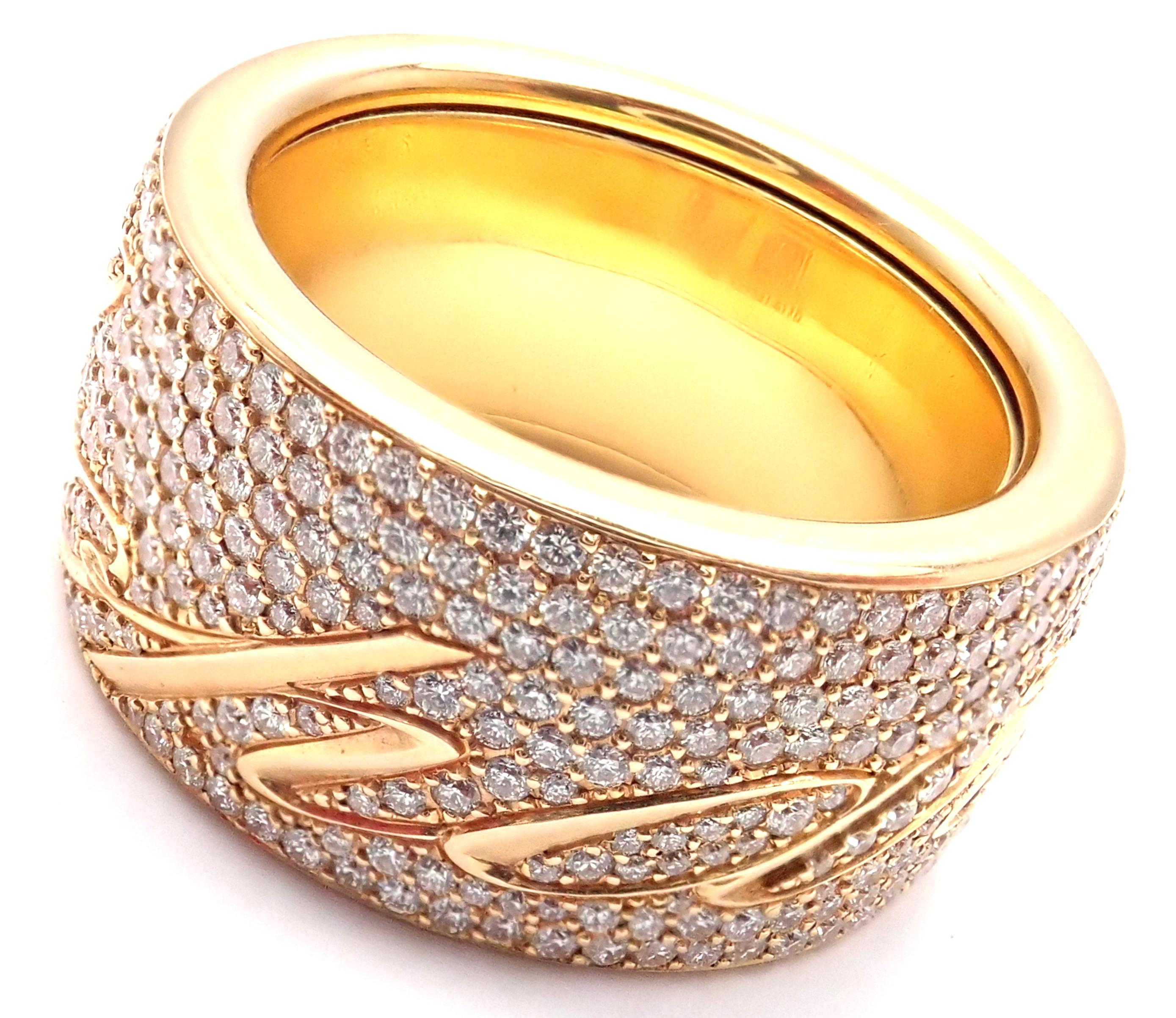 18k Yellow Gold Chopardissimo Pave Diamond Signature Wide Band Ring by Chopard. 
This ring comes with Chopard box.
With Round brilliant cut diamonds VS1 clarity, G color
Details: 
Ring Size: 6
Width: 11mm
Weight: 16.4 grams
Stamped Hallmarks: