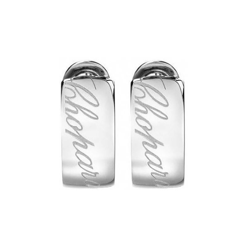 Generously sized yet classically proportioned, distinctive yet refined, Chopardissimo is everyday jewelry at its finest. Enhanced by the beautiful calligraphy of the Chopard logo engraved into the gold, these earrings in 18k white gold are as