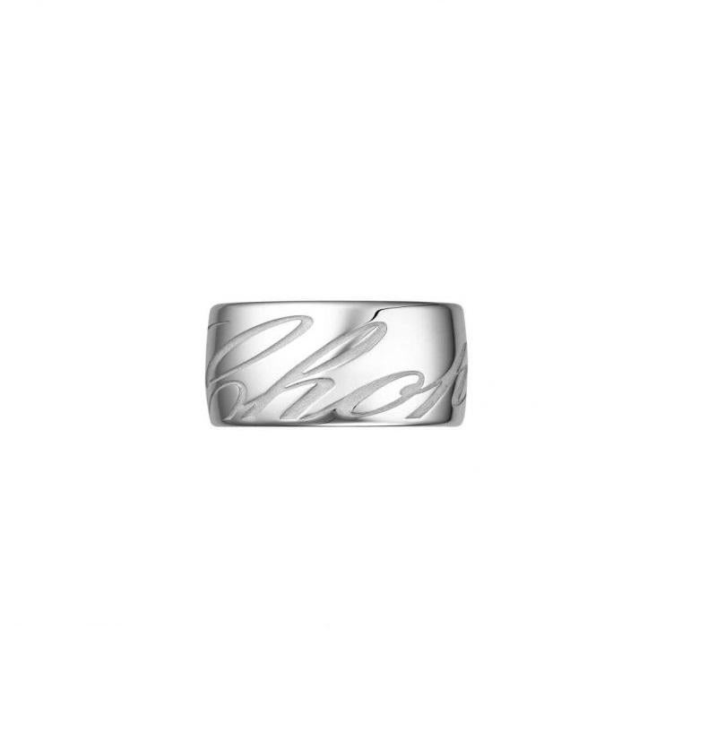 Chopard  CHOPARDISSIMO RING with 18-carat white gold.  Enhanced by the beautiful calligraphy of the Chopard logo engraved into the gold, this medium ring in 18-carat white gold is as contemporary as it is timeless and beautifully crafted down to the