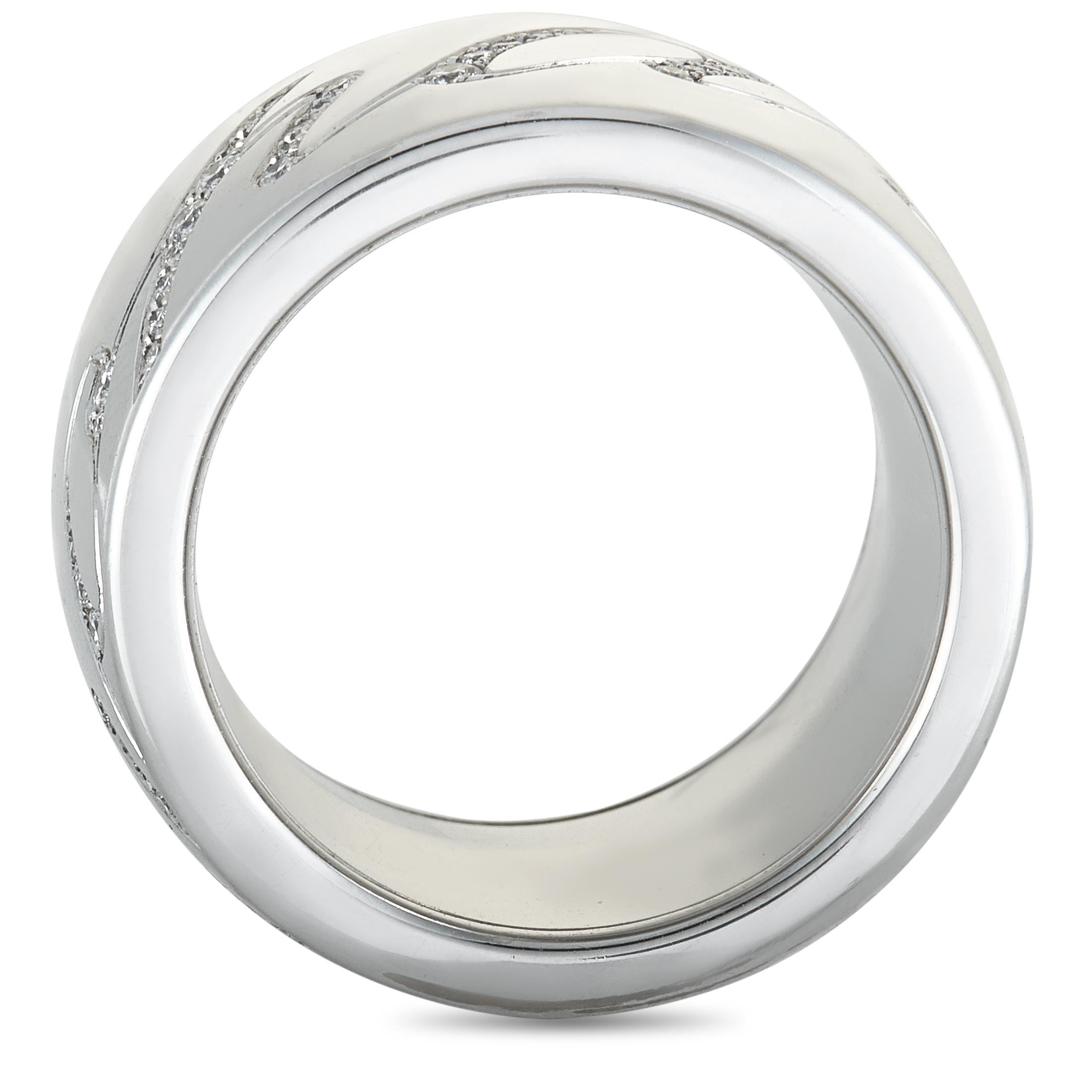 The Chopard “Chopardissimo” band ring is made out of 18K white gold and diamonds that amount to 0.35 carats. The ring weighs 23.9 grams and boasts band thickness of 14 mm.

This jewelry piece is offered in brand new condition and includes the