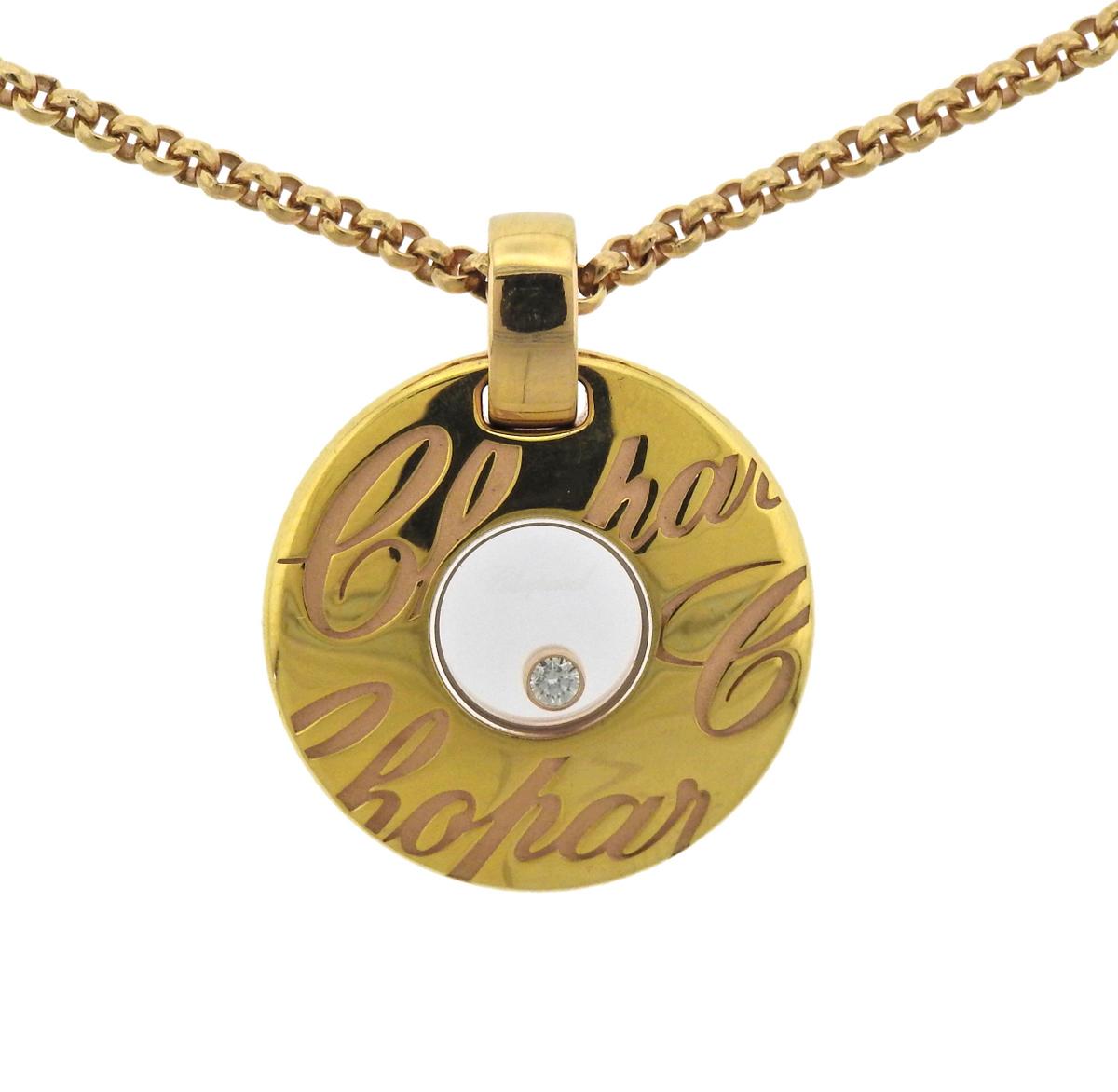  18k gold chain necklace with circle pendant, crafted by Chopard for Chippardissimo collection. Adorned with approx. 0.03ct floating diamond.  Necklace is 16.75