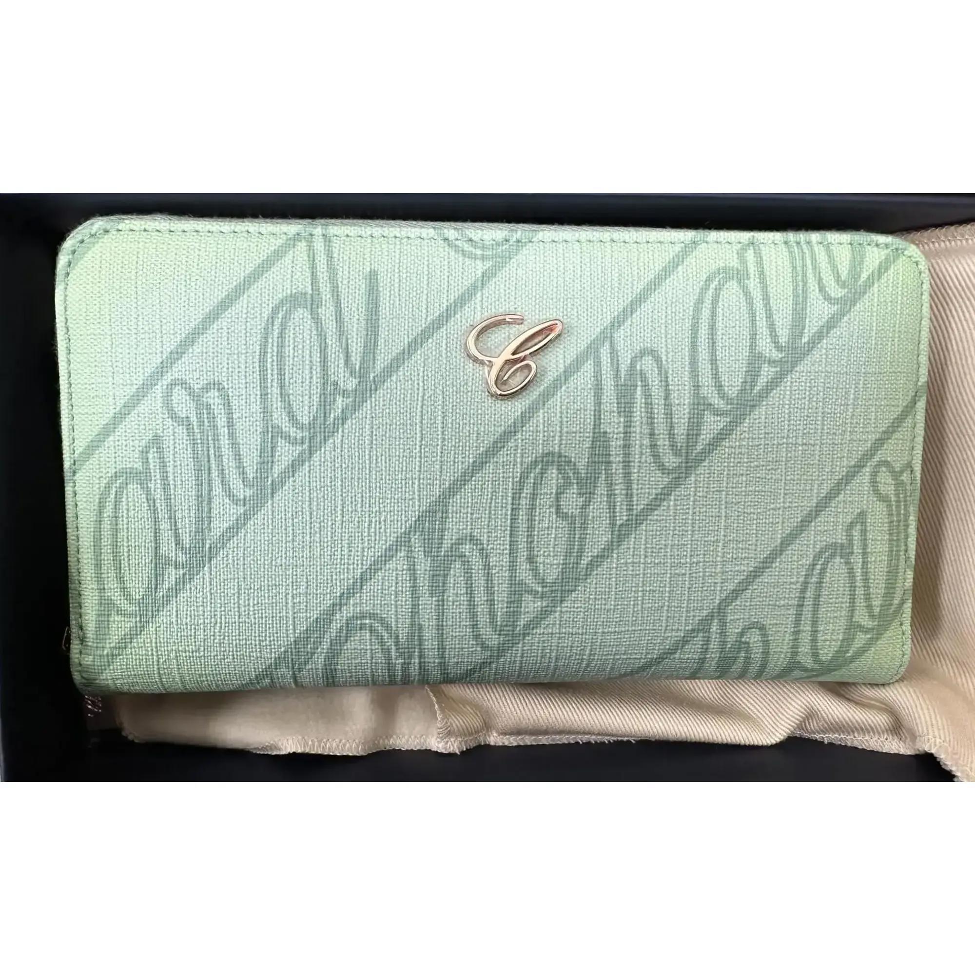 Chopard Classic ladies wallet crafted in mint green canvas with logo print and embellished with Chopard 