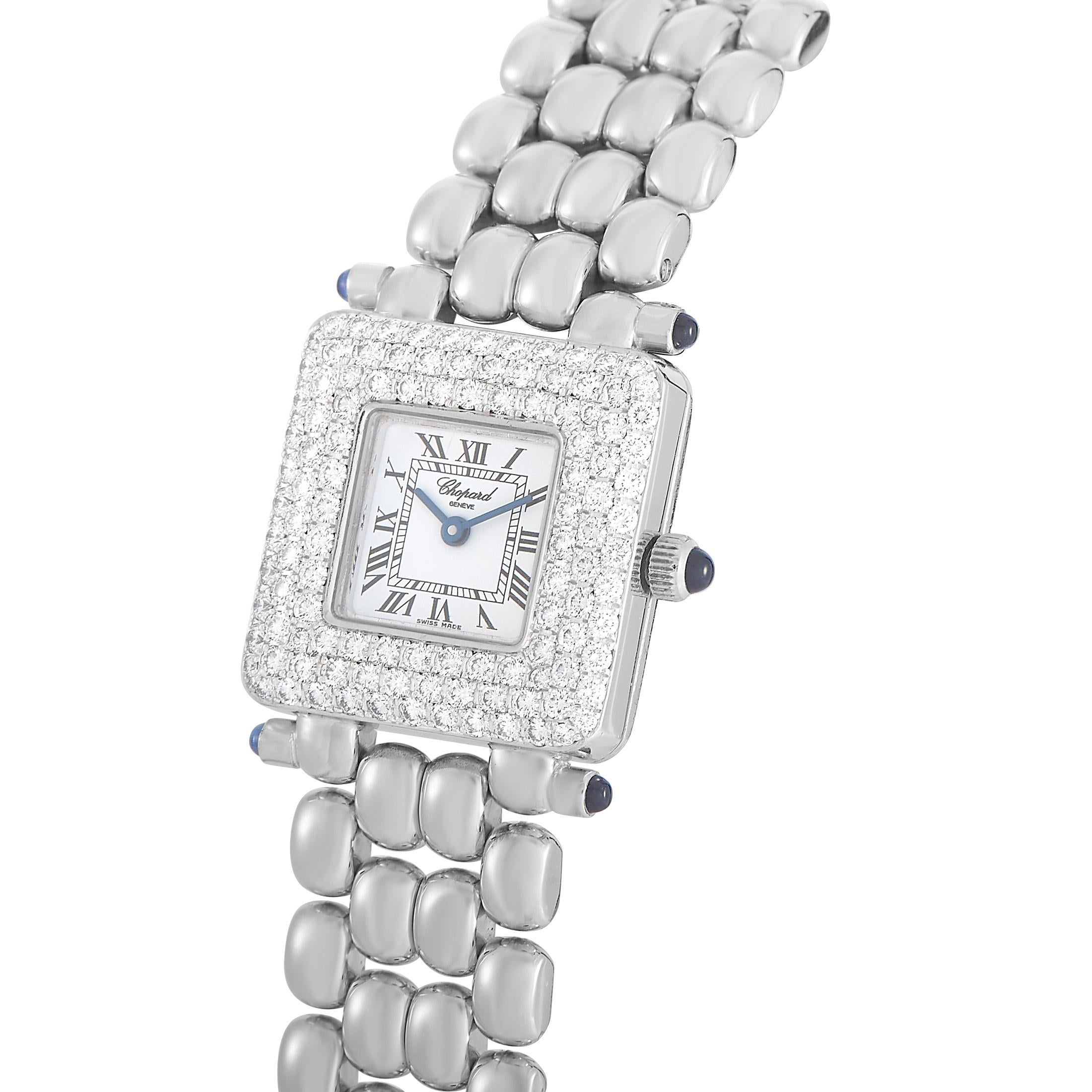 The Chopard Classic Diamond Watch, reference number 106115-23, is a chic timepiece that is at the pinnacle of luxury. 

This watch’s 28mm square case is crafted from 18K White Gold and adorned with rows of glittering diamonds. On the dainty white