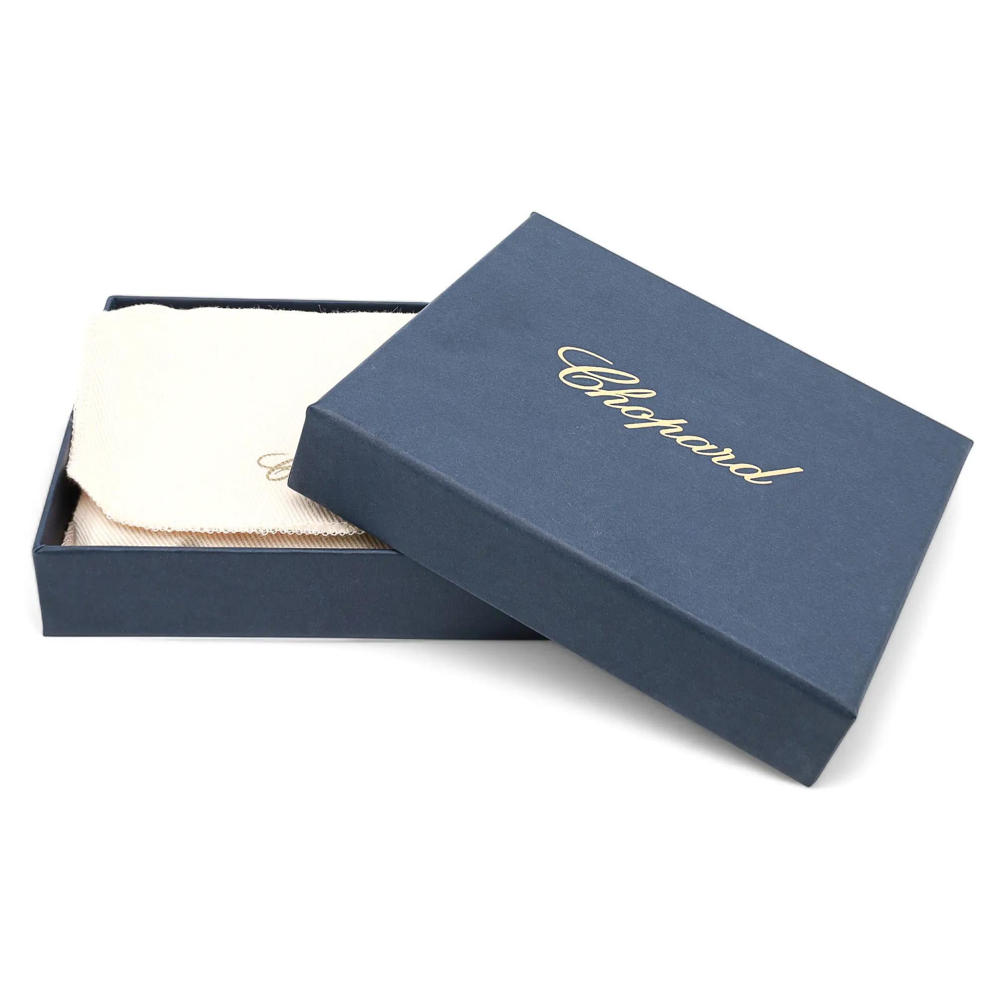 Chopard Classic Green Grained Calfskin Leather Mini Wallet. This super compact wallet features card slots and a zipper coin pocket with rose gold tone Chopard logo hardware on the front. It measures 4.5 inches x 3.5 inches. New without tags.