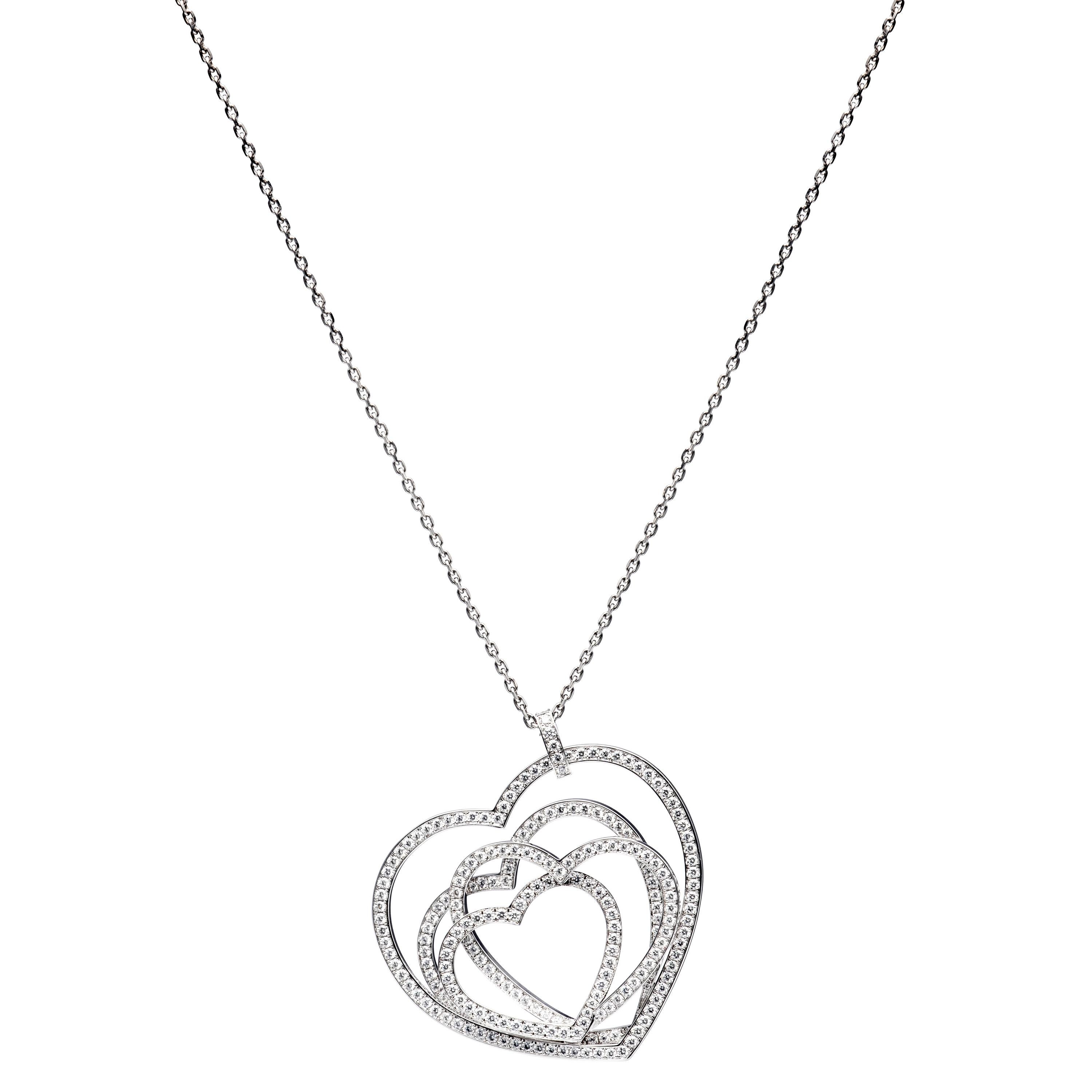 Chopard Classic Hearts Pendant

Model Number: 81/6881-1001

100% Authentic

Brand New

Comes with original Chopard box, certificate of authenticity and warranty, and jewels manual

18 Karat White Gold (12.95gr)

220 Diamonds on the Pendant