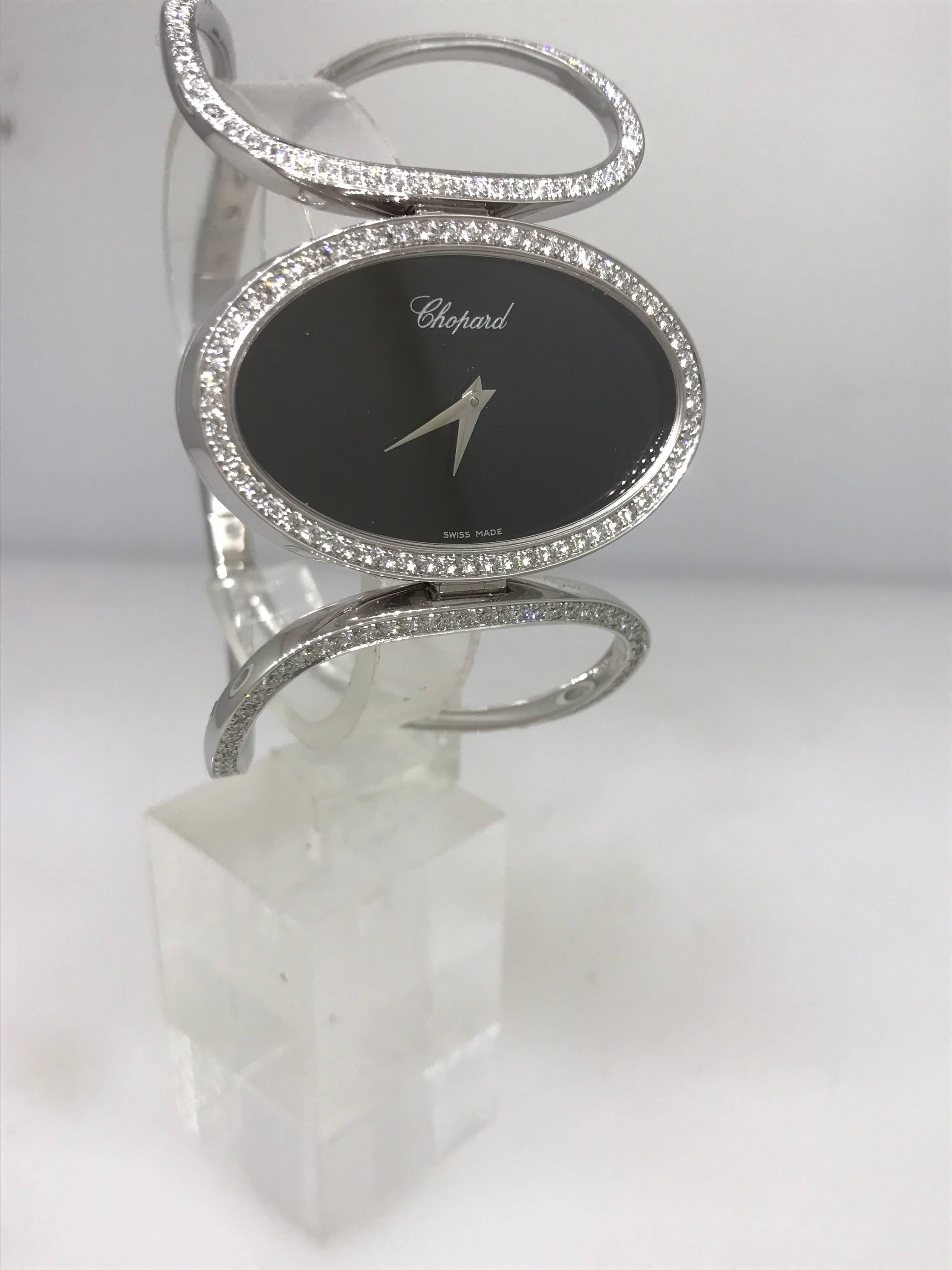 Chopard Classique White Gold and Diamond Oval Case Bracelet Bangle Lady’s Watch In Excellent Condition For Sale In New York, NY