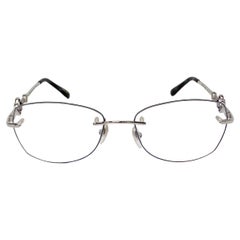 Chopard Klare rahmenlose silberfarbene Metallbrille mit Kristallakzenten