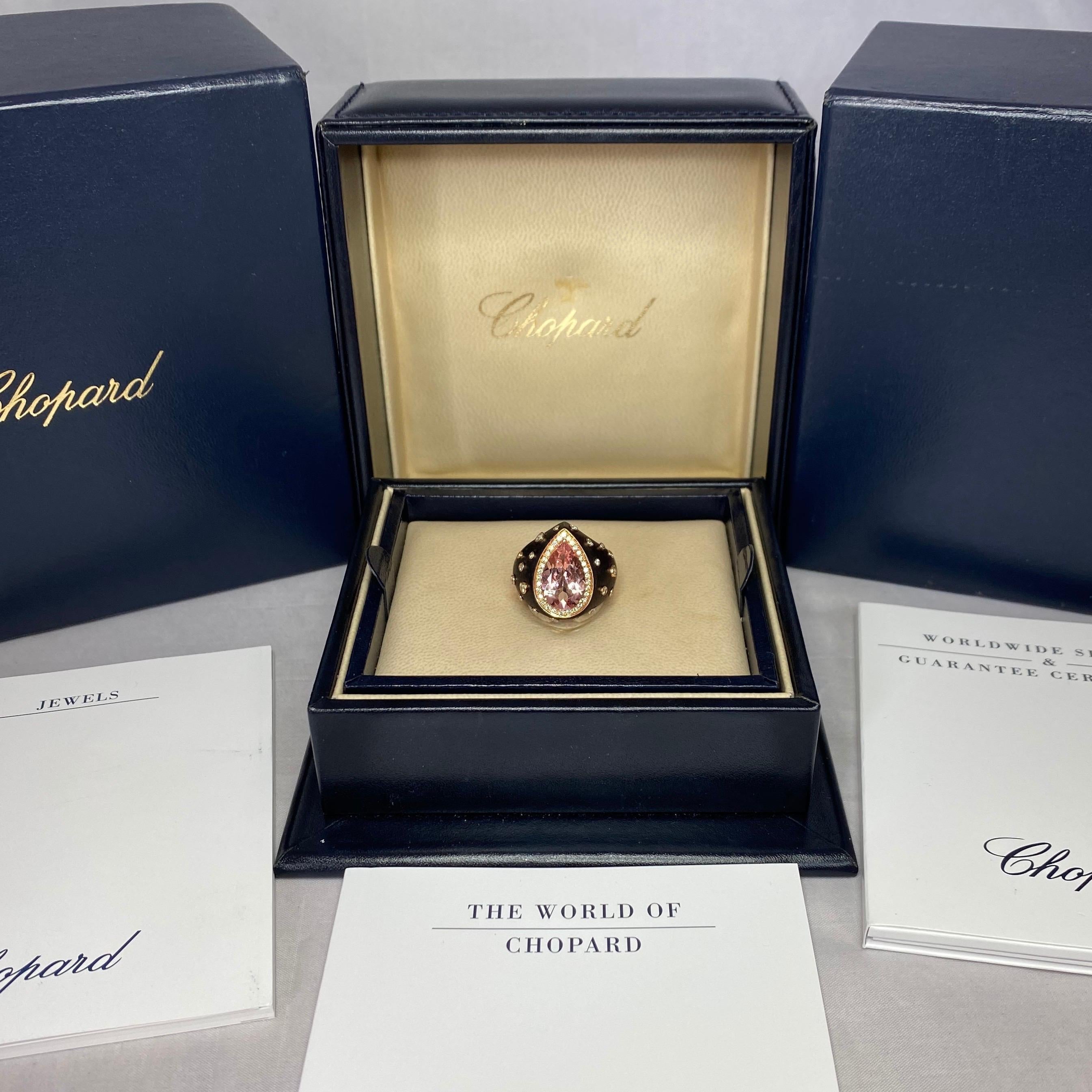 Unique Custom Made Chopard Morganite & Diamond 18k Yellow Gold Ring.

This is a stunning ring with a centre morganite of approx 3.8 carats surrounded by diamonds and set in a black resin with 18k yellow gold, a totally unique design and contrast of