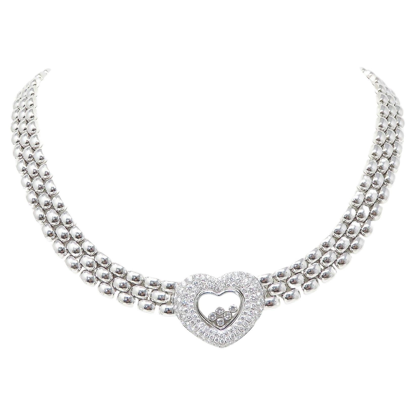 Introducing an exquisite Chopard necklace, meticulously crafted from 18K white gold
Diamonds tested and are natural, approx 2.8ct TW, most about F-G and VS range
Necklace 16 inches long and 11mm wide. Pendant 26 x 22mm
Marked: Chopard 81/5427-20 750