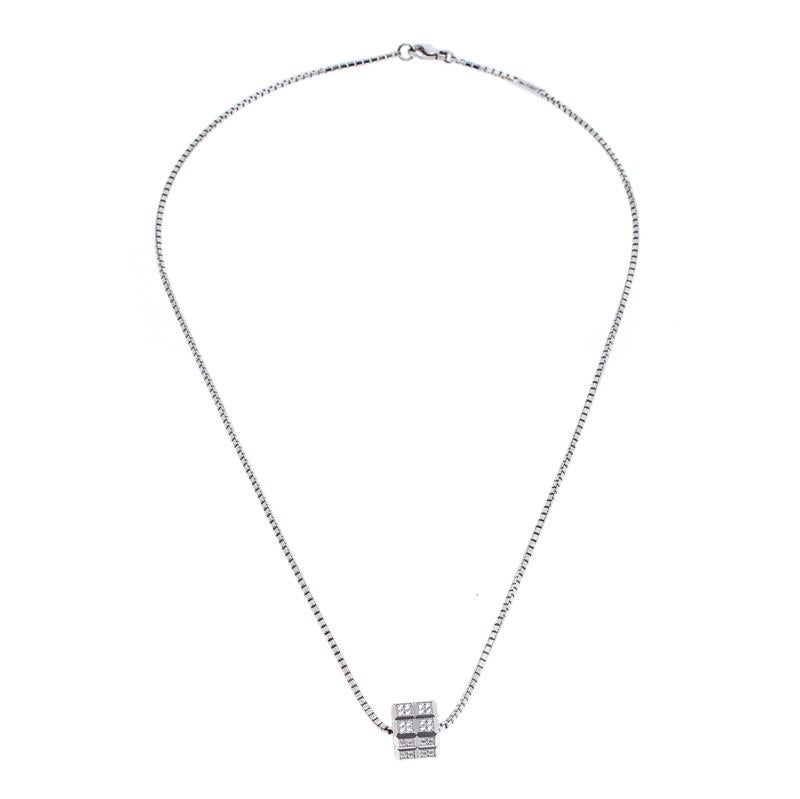 Gift yourself some love with this elegant necklace from Chopard! The piece is impeccably sculpted from 18k white gold and both the chain and pendant are detailed with textures mimicking ice cubes. The intricate geometrical cubes of the pendant are