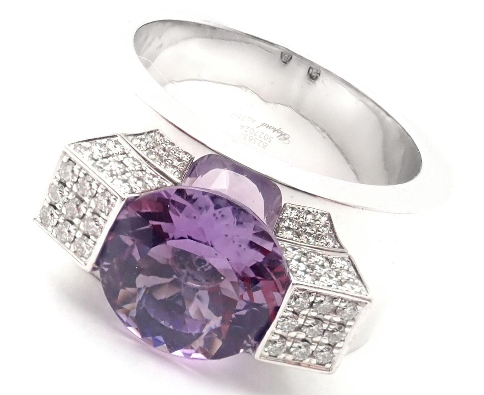 18k White Gold Diamond Amethyst Wide Band Ring by Chopard. 
With 72 round brilliant cut diamonds VVS1 clarity, E color total weight approximately .40ct
1 round amethyst stone 10mm
Details: 
Ring Size: 7
Weight: 18.6 grams
Width: 10.5mm
Stamped