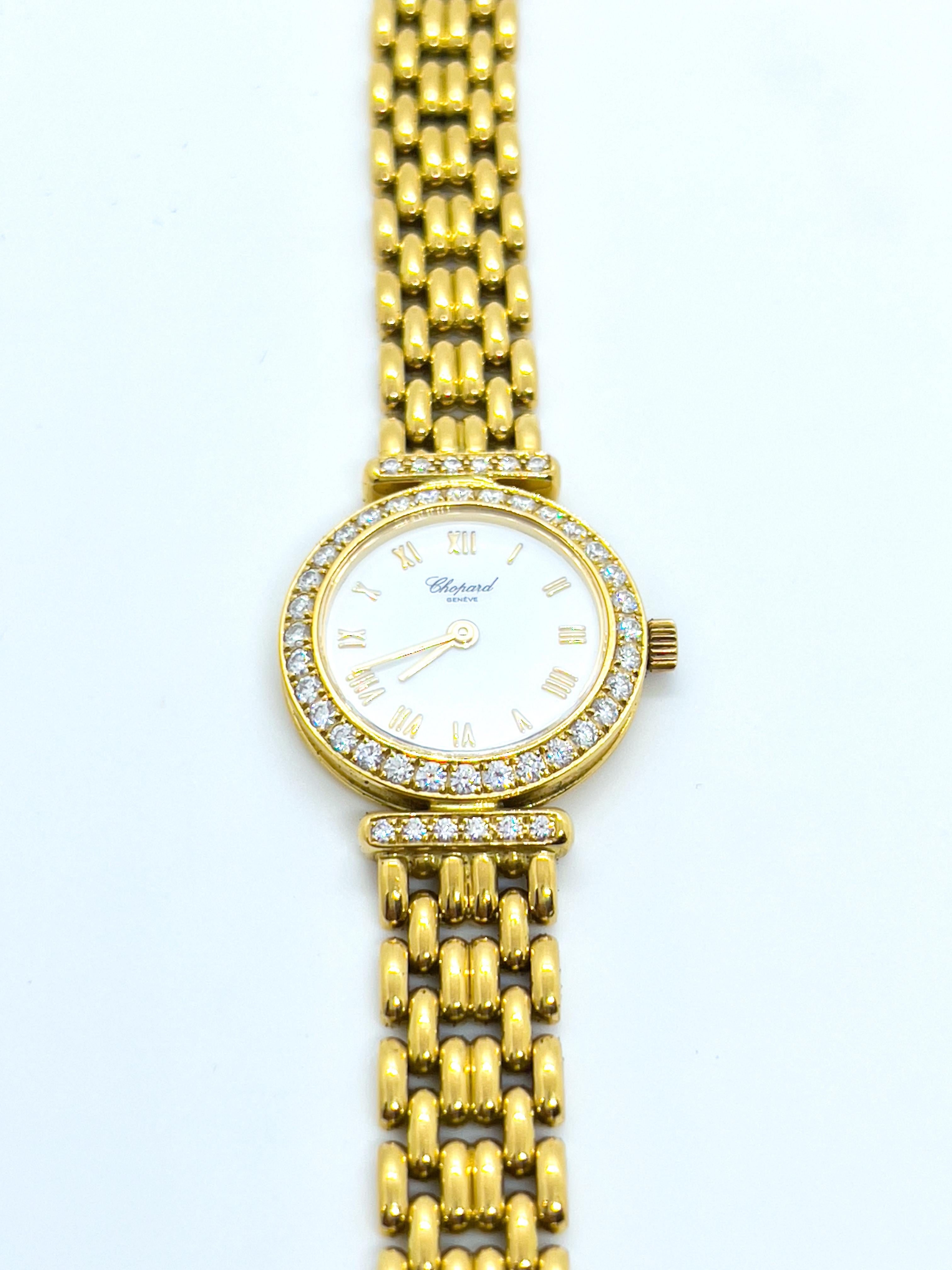 Timeless classic from Chopard. An elegant watch crafted in 18K yellow gold. White round dial with Roman numerals surrounded by round-cut white diamonds.

Total weight: 41 grams
Total length: 16 cm 
Movement: quartz
