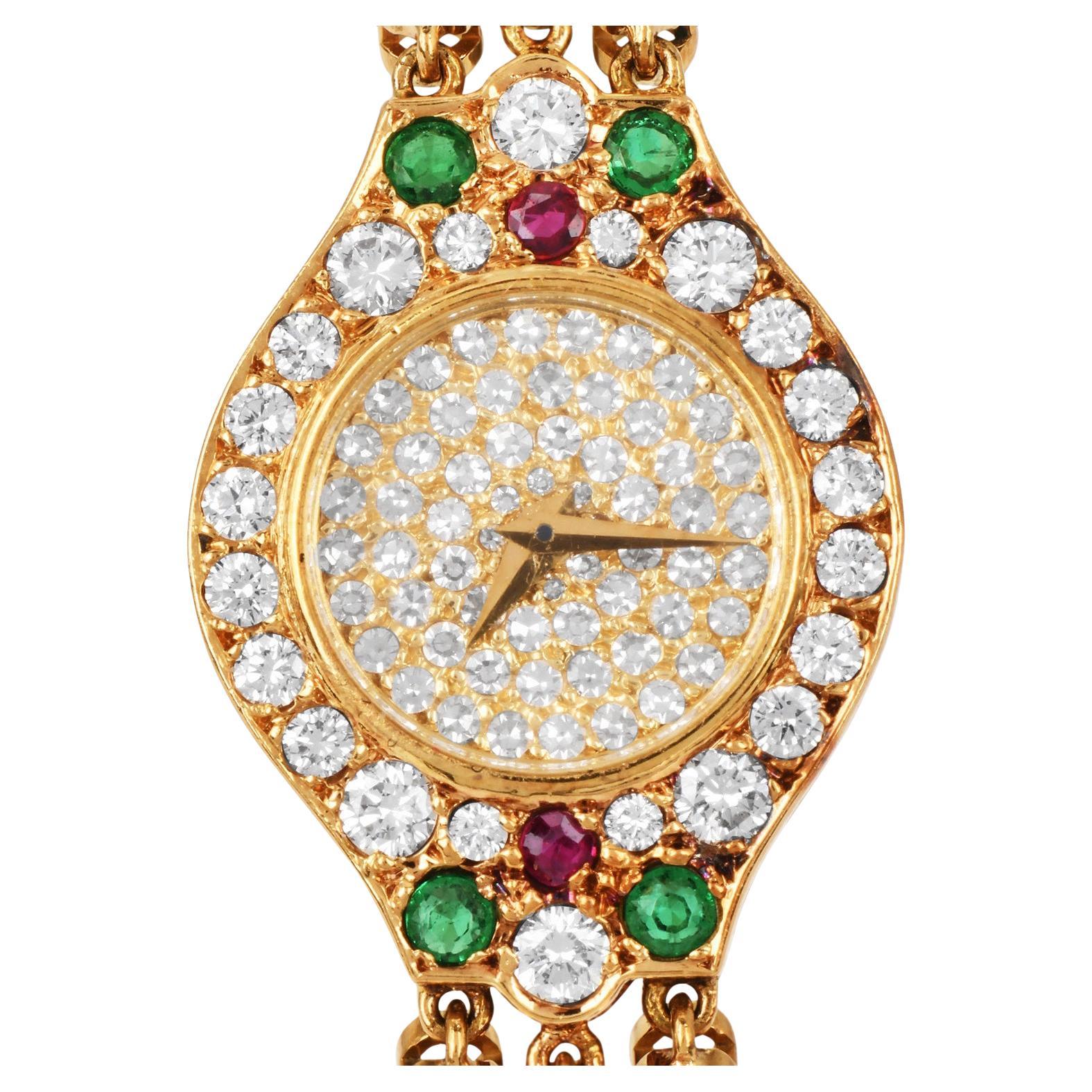  Chopard Diamond Emerald Ruby Sapphire Gold Watch 

A luxurious Chopard Watch crafted in solid 18K gold, this watch features a dazzling array of precious stones offering a timeless and elegant base for the intricate settings of various gems.

The