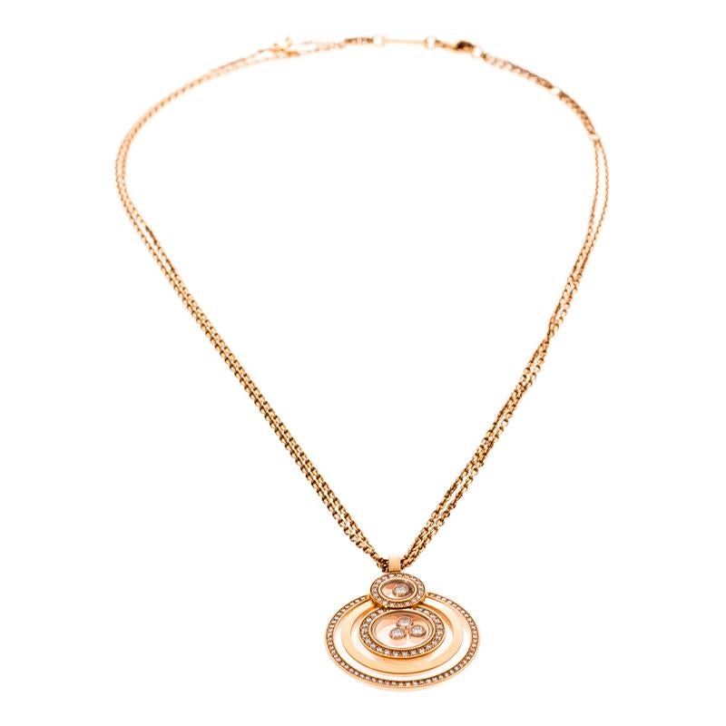 To call this creation simply a necklace would be unjust. It is more a work of beauty than a piece of jewelry. It is from Chopard's Happy collection and it comes made from 18k rose gold. The pendant's magnificence is seen in its division of rings