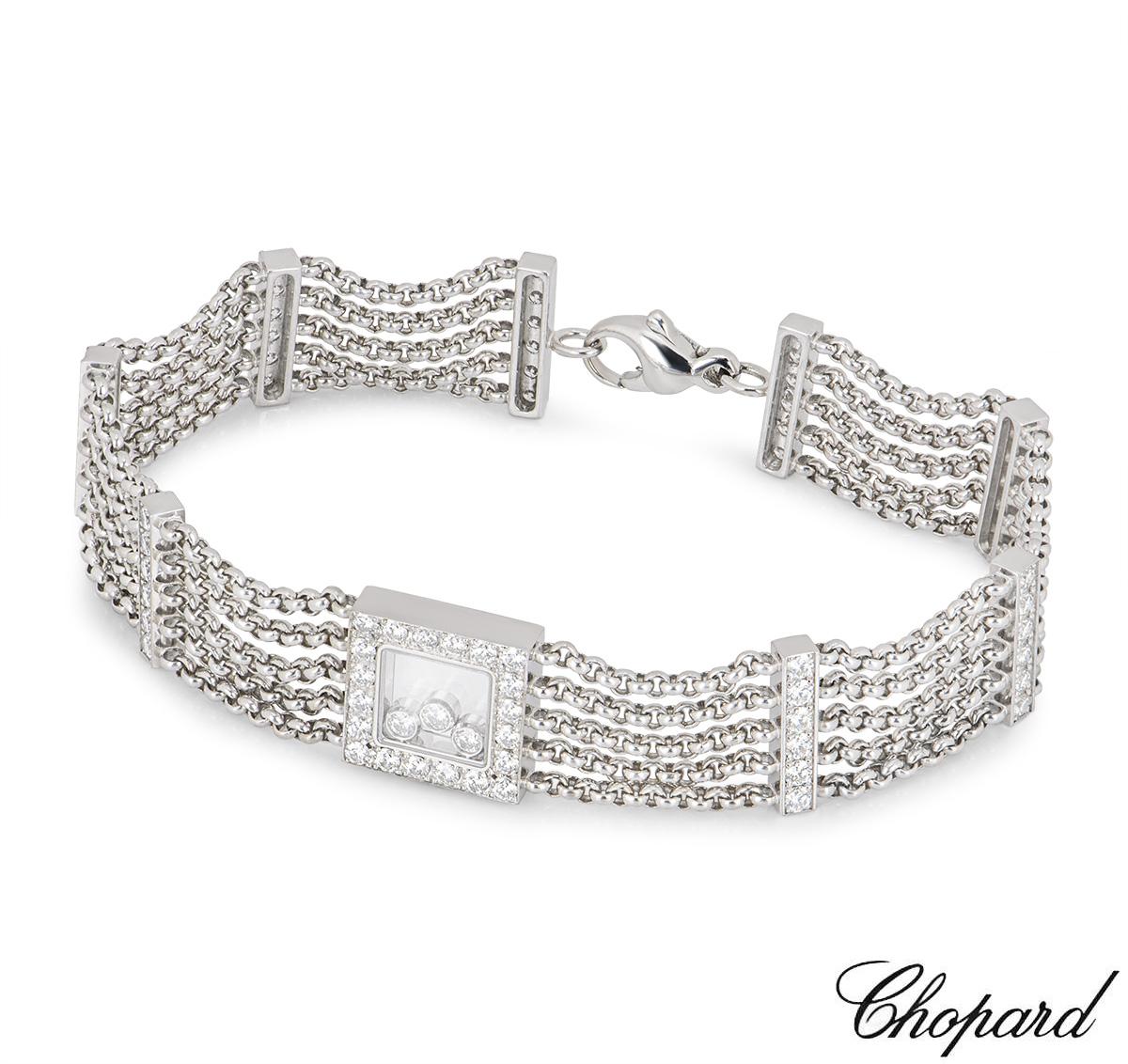 An 18k white gold bracelet from the Chopard Happy Curves collection. The bracelet is set to the centre with a single square motif, pave set with round brilliant cut diamonds, featuring 3 floating round brilliant cut diamonds enclosed behind the
