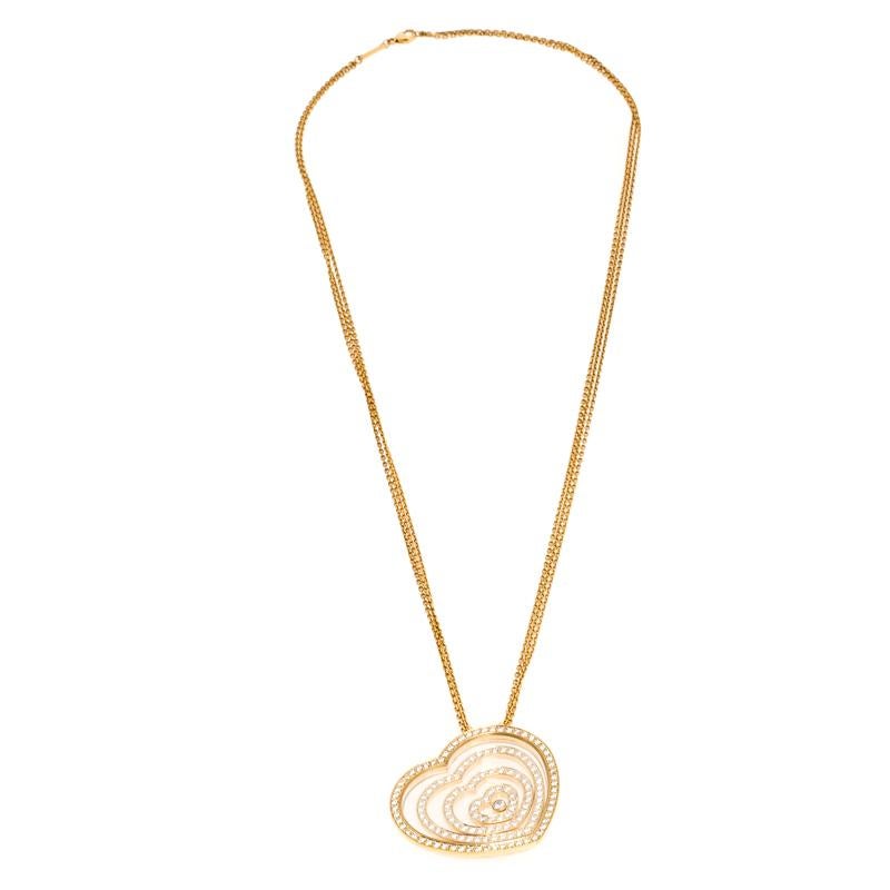 A collection loved by fashion lovers all around, the Chopard Happy collection brings out this beautiful necklace for you to flaunt. Flawlessly constructed in 18K yellow gold, this necklace features a wonderfully-designed heart pendant. The outer
