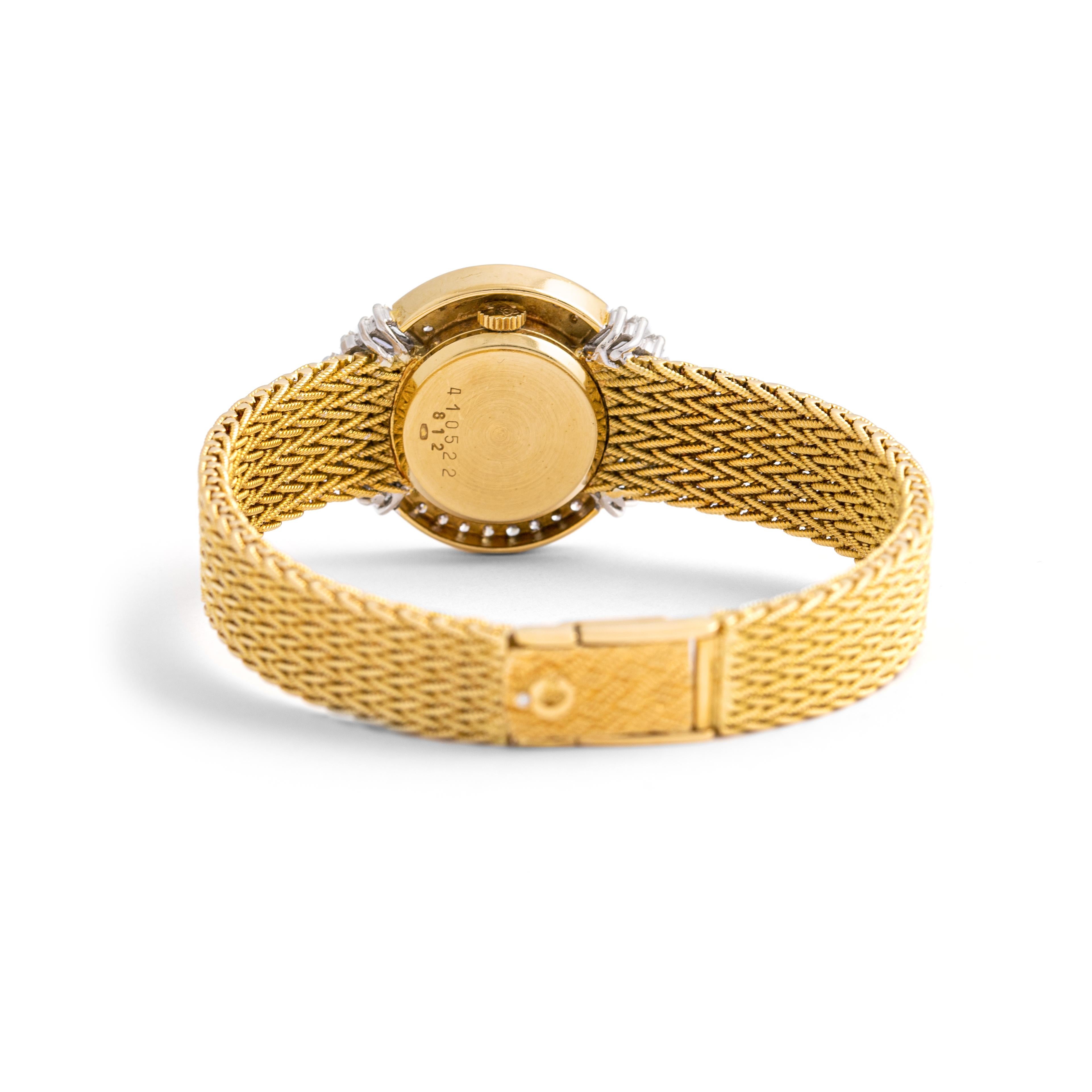Chopard Diamond Yellow Gold 18K Wristwatch.
Pave set by round cut and baguette-cut diamonds.
Signed Chopard. 
Numbered 410522 812.

Case dimensions: 3.50 x 2.50 centimeters.
Wrist length: approximately 16.50 centimeters.
Total weight: 50.98