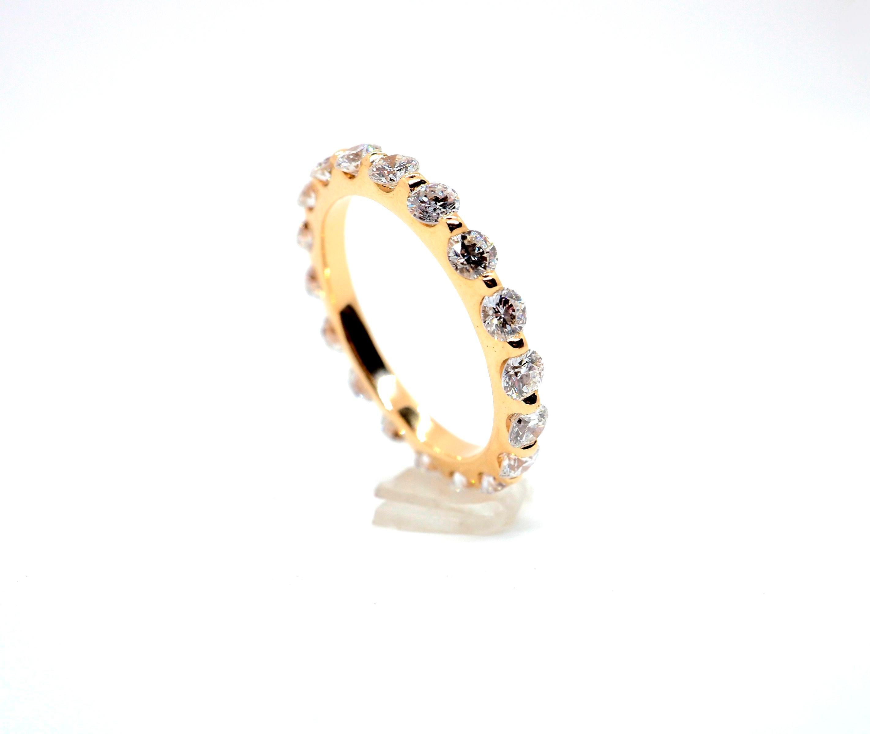 Sublime ring made in 18k yellow gold signed by the prestigious brand Chopard. 
Eternity ring decorated with 18 round diamonds GH-VVS-VS approximately 2 carats 
An amazing piece that attracts all eyes, perfect for all kinds of occasions. 

Chopard