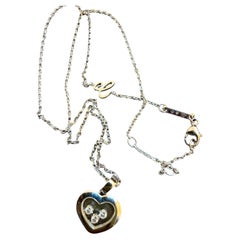 Collana Chopard con ciondolo a forma di cuore “Floating Happy Diamonds Icons”, in oro bianco 18 carati (KWG), con certificato