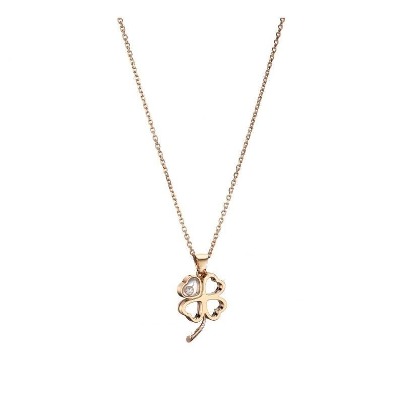 Chopard GOOD LUCK CHARMS PENDANT with 18k rose gold and diamond. A stunning four-leaf clover pendant in 18k rose gold delicately hangs from a feminine chain. Joyful and unique, its rounded lines hold a freely moving diamond, dancing in celebration