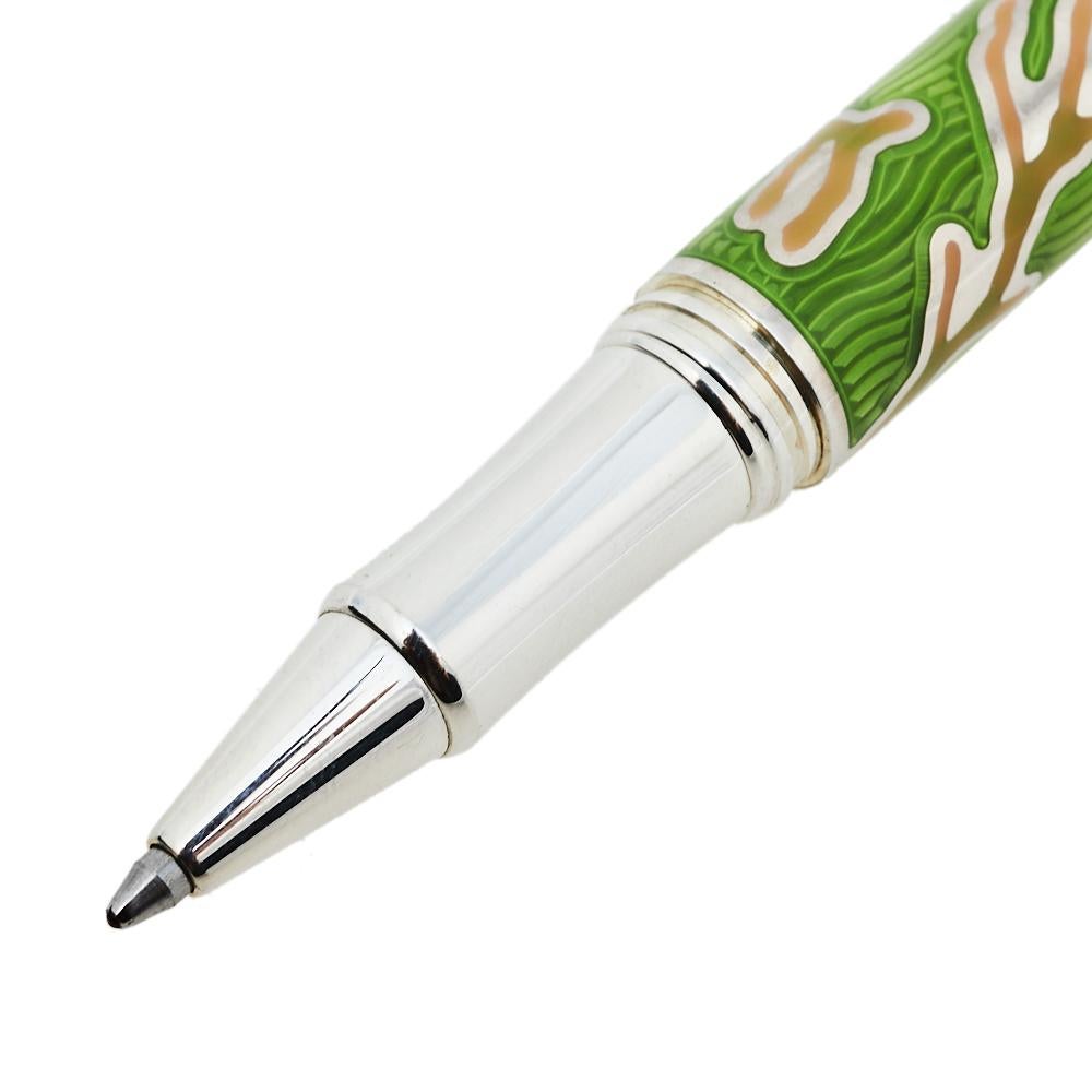 Showcasing a sterling silver body, this rollerball pen is a limited edition piece from the house of Chopard. Featuring a green-pink enameled coral design and signature engravings, this rollerball pen carries black ink and provides the best writing