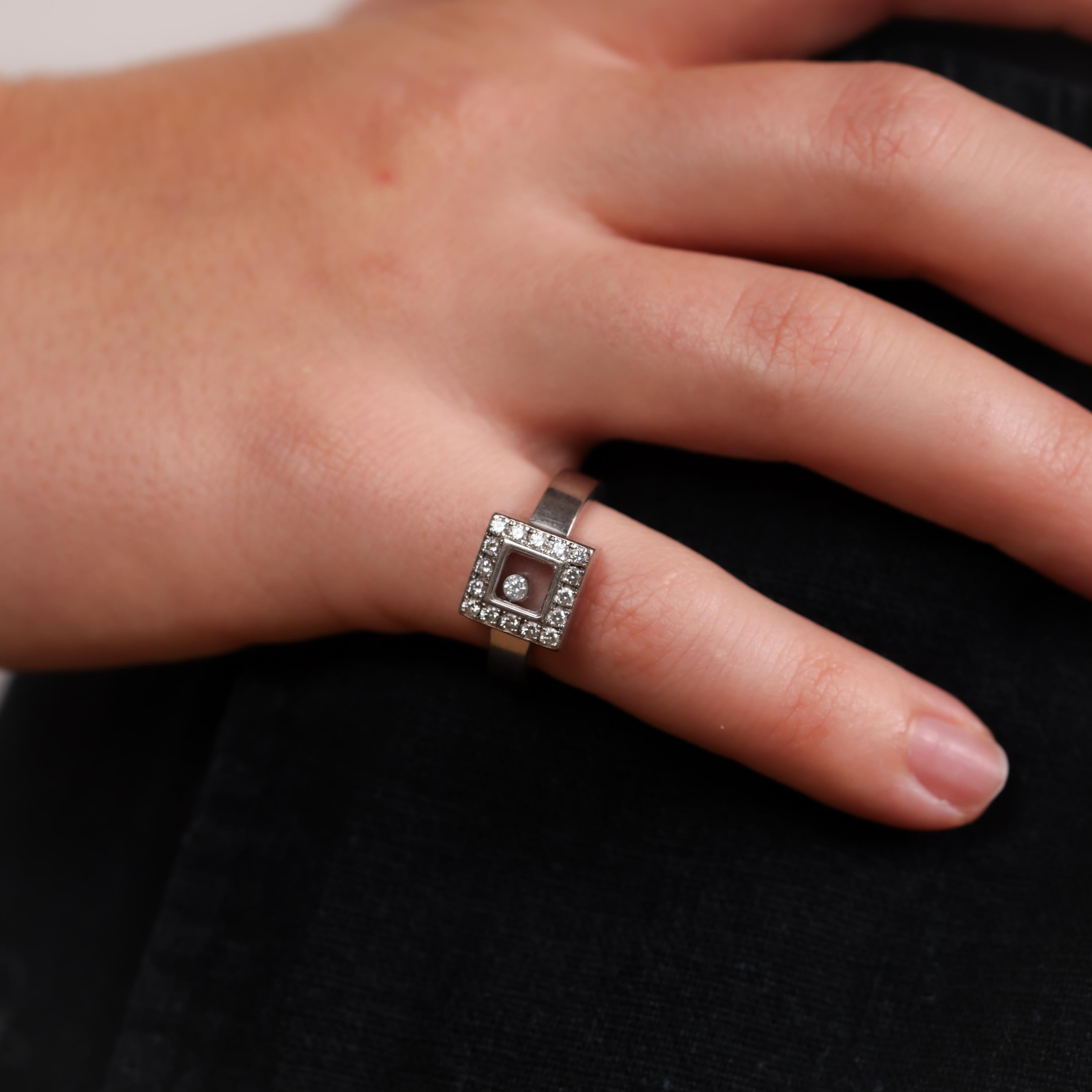 This vintage Chopard 18k white gold ring sparkles with 17 brilliant diamonds, showcasing timeless luxury and exquisite craftsmanship from the 2000s.

Brand: Chopard
Center stone: 17 round brilliant cut diamonds
Weight: Approximately 0.45 carats