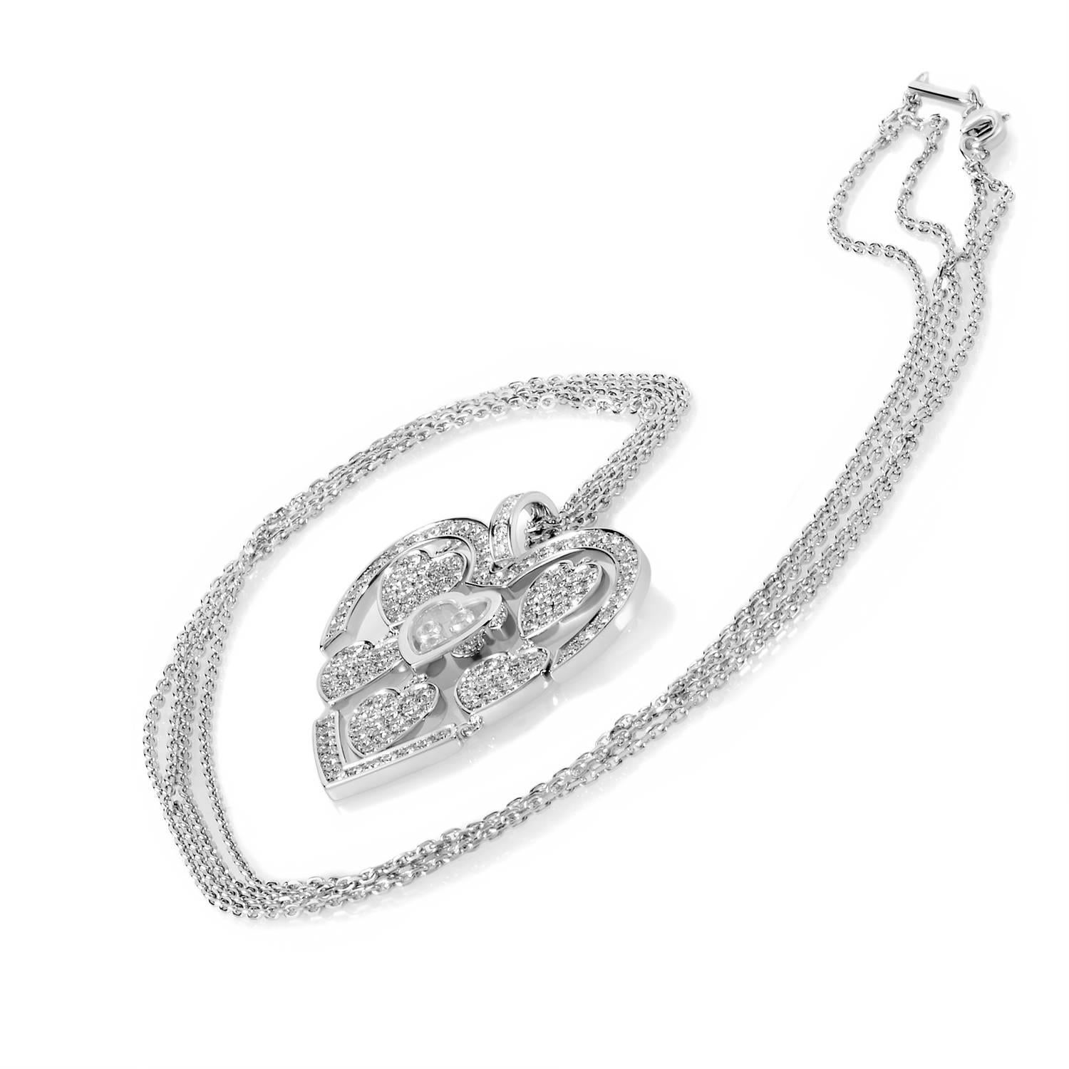 This Happy Amore Pendant Necklace from Chopard features an alluring, feminine design that will leave you breathless. Its heart-shaped pendant is adorned with 2.38 ct. worth of diamonds and hangs from an beautiful 23-inch chain.