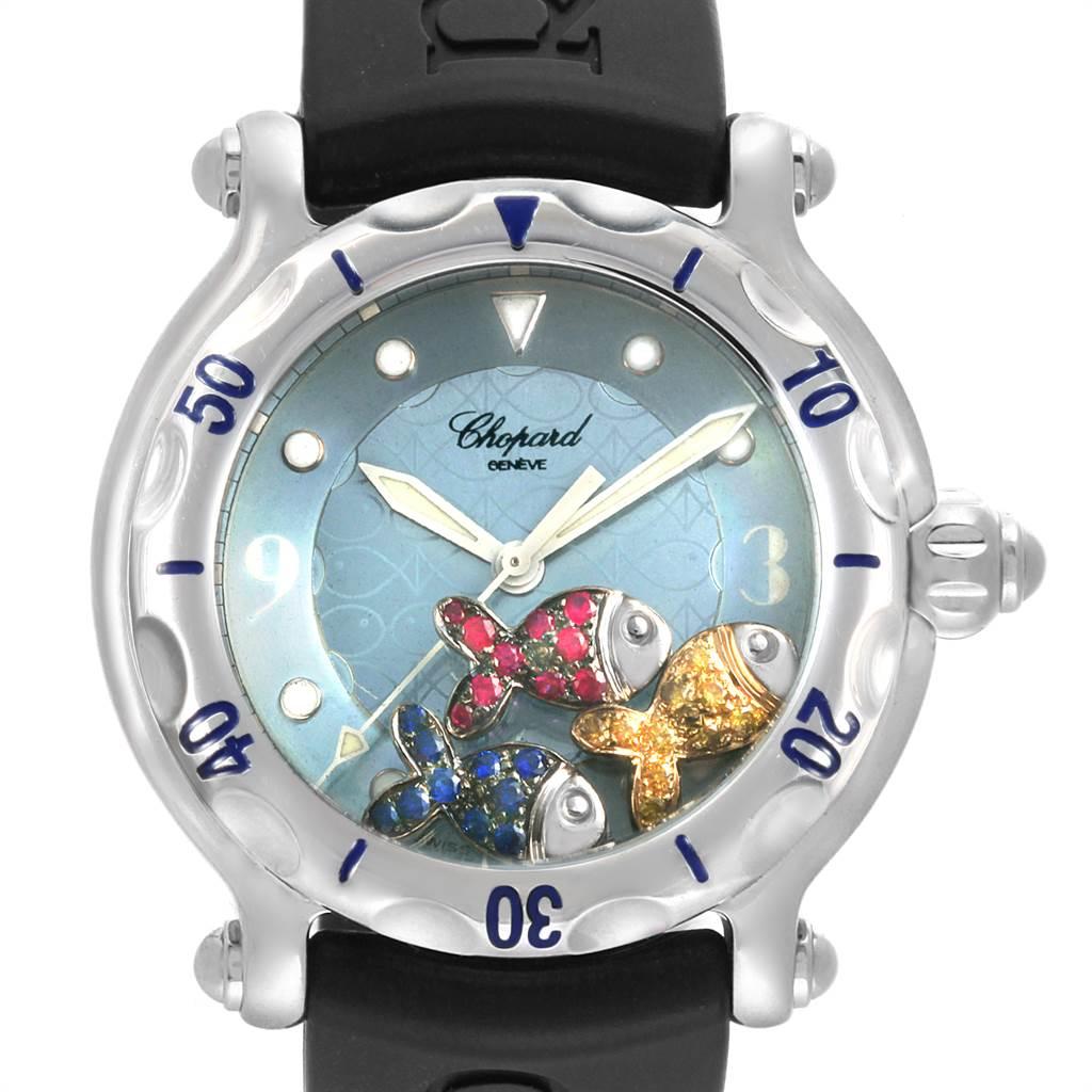 Chopard Happy Beach Floating Rubi Sapphire Fish Ladies Watch 288347. Quartz movement. Stainless steel round case 38.0 mm in diameter. Stainless steel rotating bezel. Scratch resistant sapphire crystal. Blue dial with with 3 trademark Happy Fishes