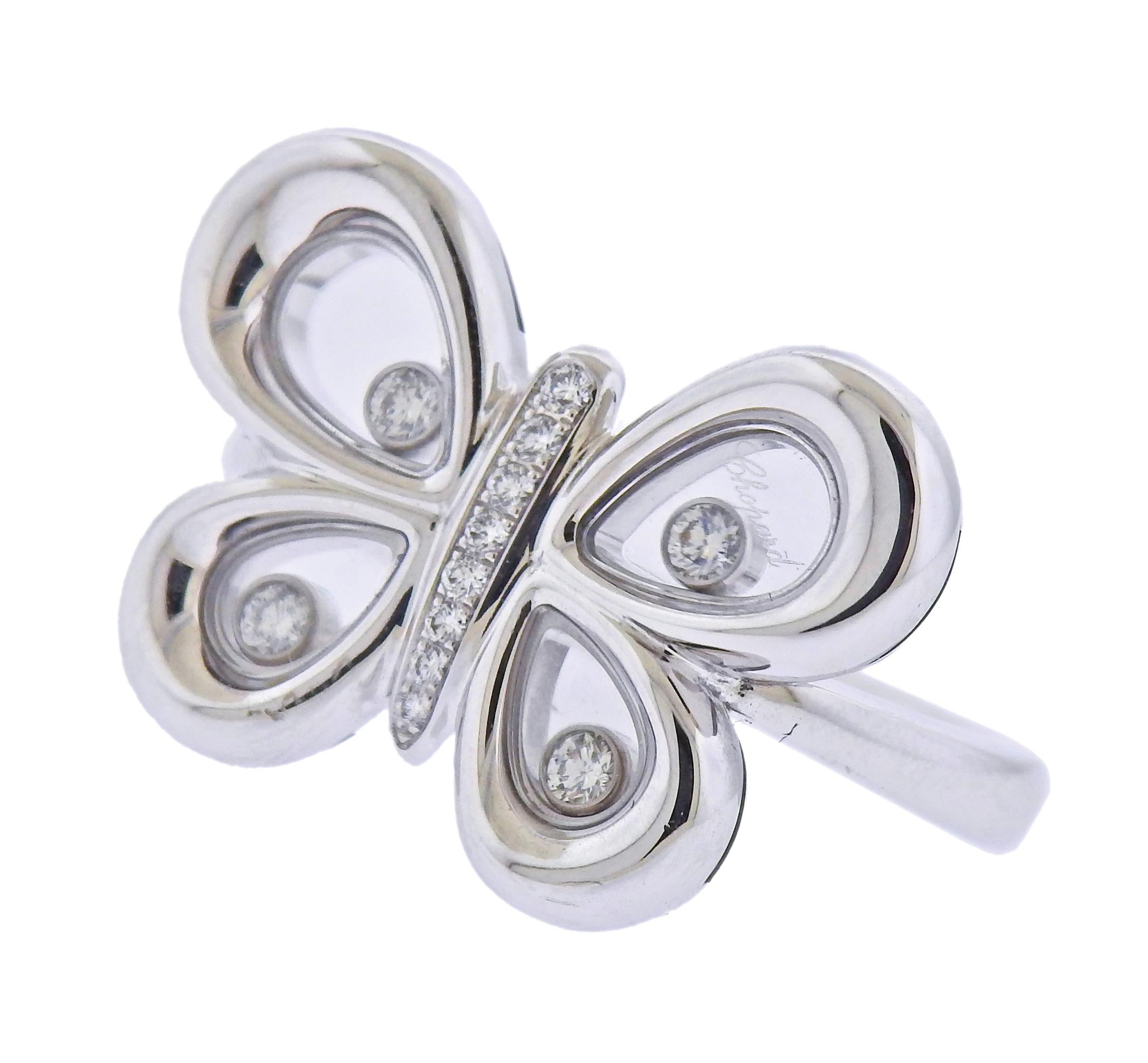 New 18k white gold Happy Butterflies ring by Chopard, with approx. 0.12ctw in GH/VVS diamonds.  Retail $6500, with box and papers.  Ring size - 6, ring top is 17mm x 22mm. Marked: Chopard, 750, 829511-1210, 6362654. Weight - 11 grams. 