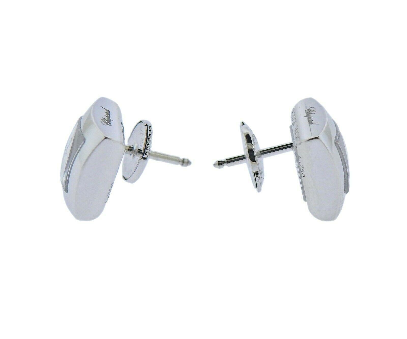 Pair of new 18k white gold square earrings by Chopard, with approx. 0.16ctw in FG/VVS diamonds. Retail $3650. Studs measure 9mm x 9mm. Marked:  Chopard, Au 750, 839224-1001. Weight - 6.1 grams. 