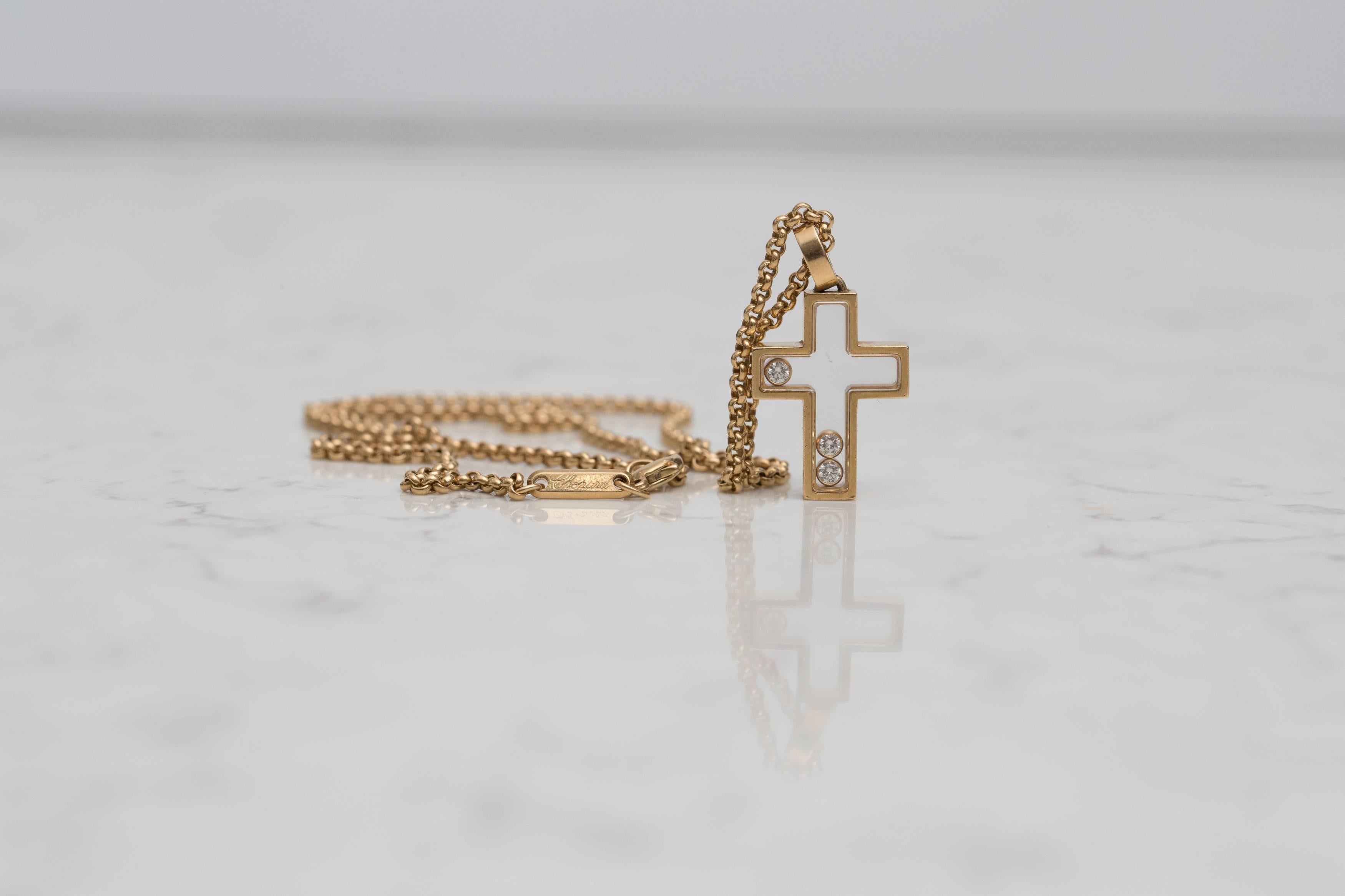 Taille ronde Chopard, collier croix Happy Diamond en or jaune 18 carats