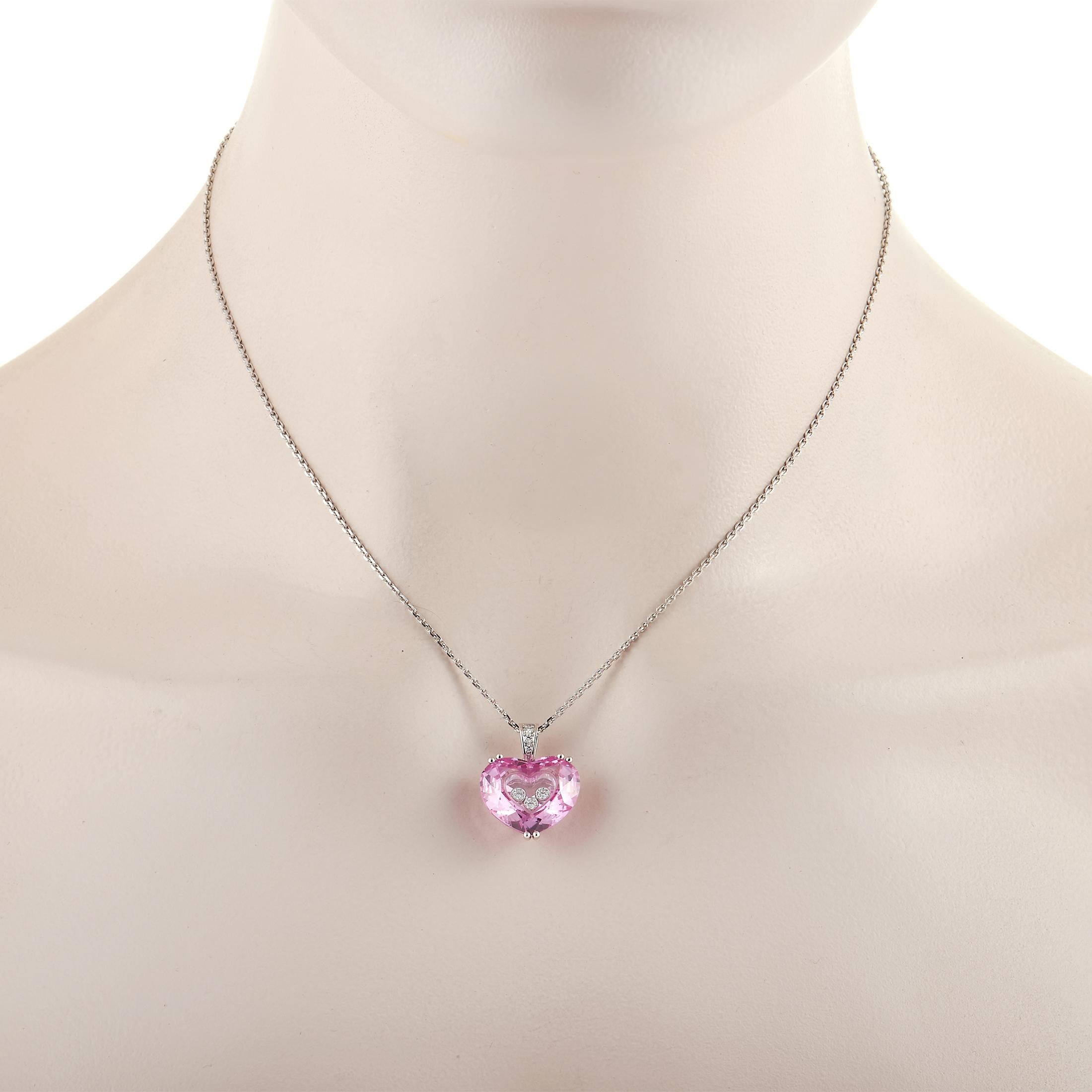 This piece from the Chopard Happy Diamond collection is pure magic. Suspended from an 18K White Gold chain that measures 16” long, you’ll find a charming pink crystal heart pendant that measures 0.75” long and 0.32” wide. It’s accented by an array