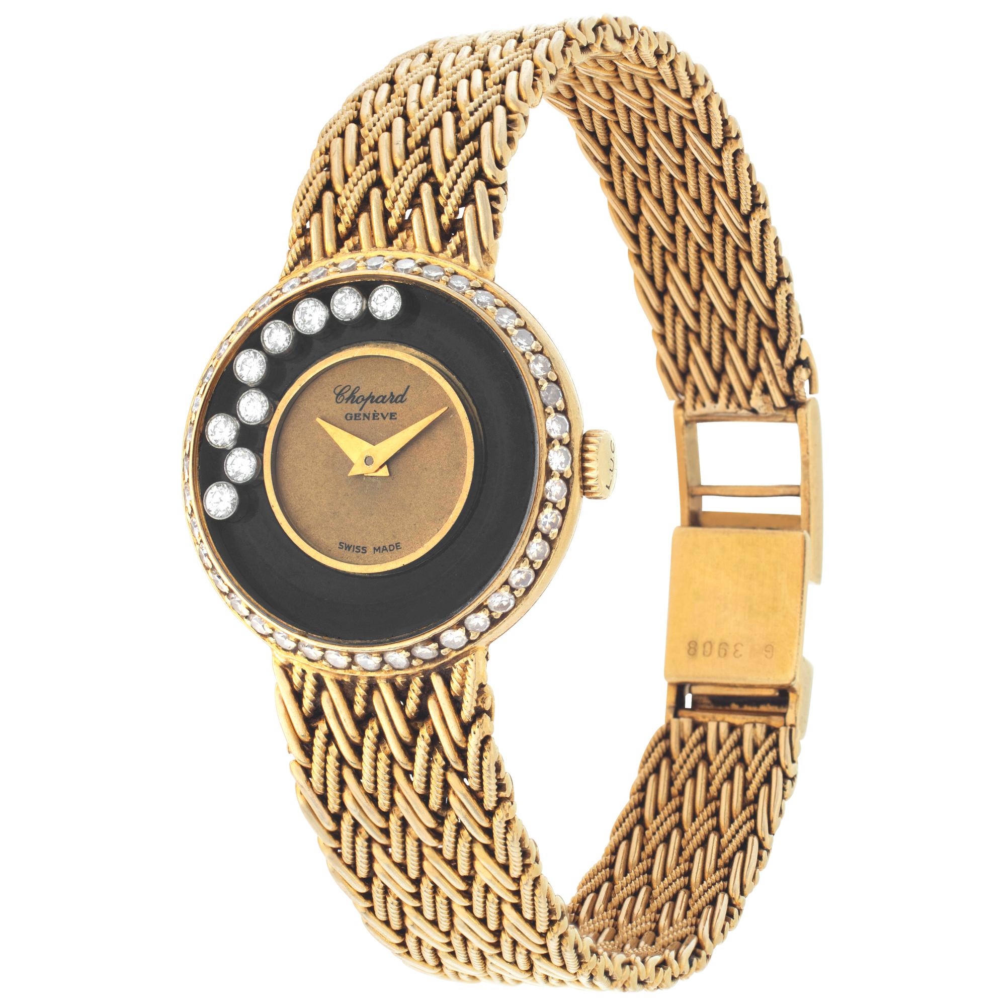 Chopard Happy Diamond in 18k yellow gold with 9 floating diamonds around dial and diamond bezel. Quartz. 20.5 mm case size. Ref 4045. Will fit a 6.25