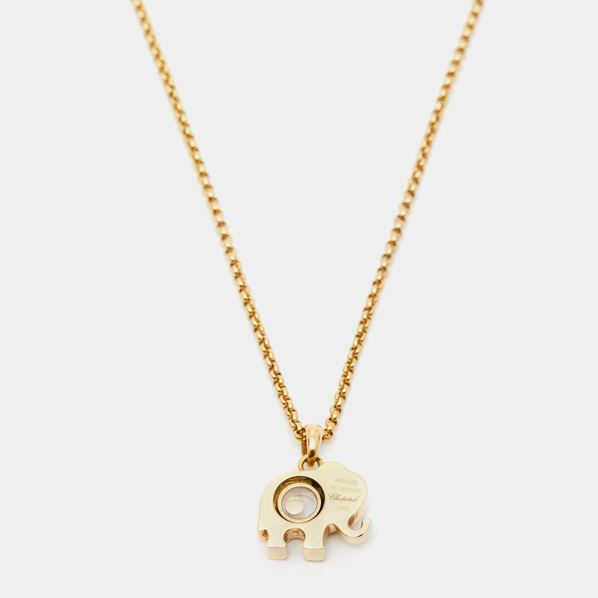 A playful twist to add to your everyday jewelry collection, this Chopard necklace is such a thing of beauty. Crafted using 18k yellow gold, the chain holds a diamond-studded elephant motif with a moving diamond dancing between two sapphire crystals,
