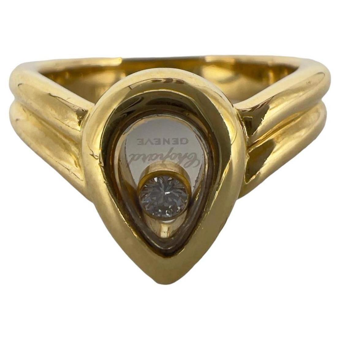 Chopard 750 Gold Ring set with a mobile brilliant-cut diamond under glass, signed ,finger  51-11