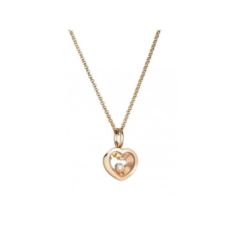 The Very Chopard line blends the pretty femininity of gentle curves with a highly contemporary look. Nestled within this heart-shaped  pendant  in  18-carat  rose  gold,  the  moving  diamond  floats  freely  between  two  sapphire  crystals.  The