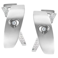 Chopard Boucles d'oreilles Happy Diamond Heart en or blanc 18 carats avec diamants flottants