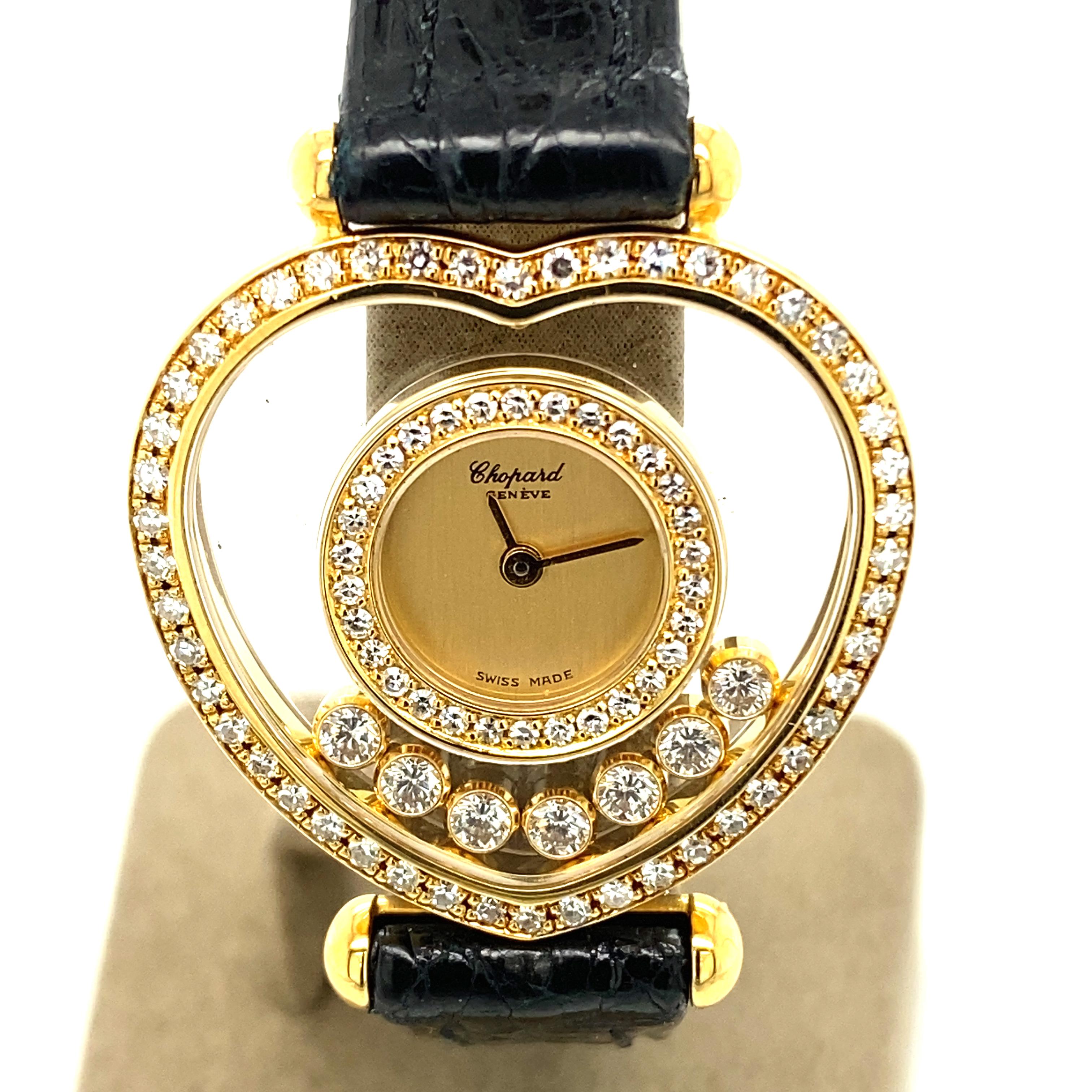 This elegant ladies' watch by Swiss jeweller/watchmaker Chopard is crafted in 18 karat yellow gold. The double bezel is set with 77 single-cut diamonds and 7 'floating' brilliant-cut diamonds, weighing approximately 0.95 carats.

Comes in its