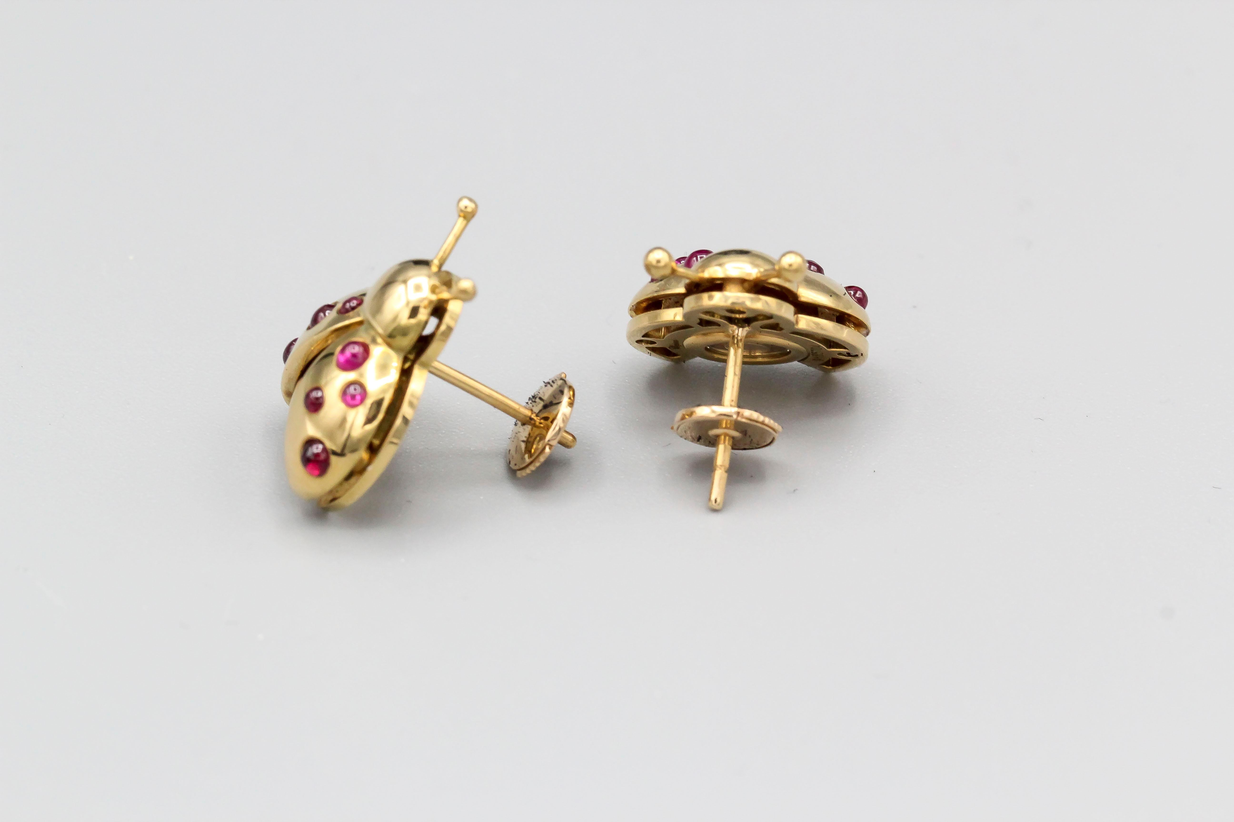 Whimsical ruby, 18K yellow gold and diamond earrings from the 