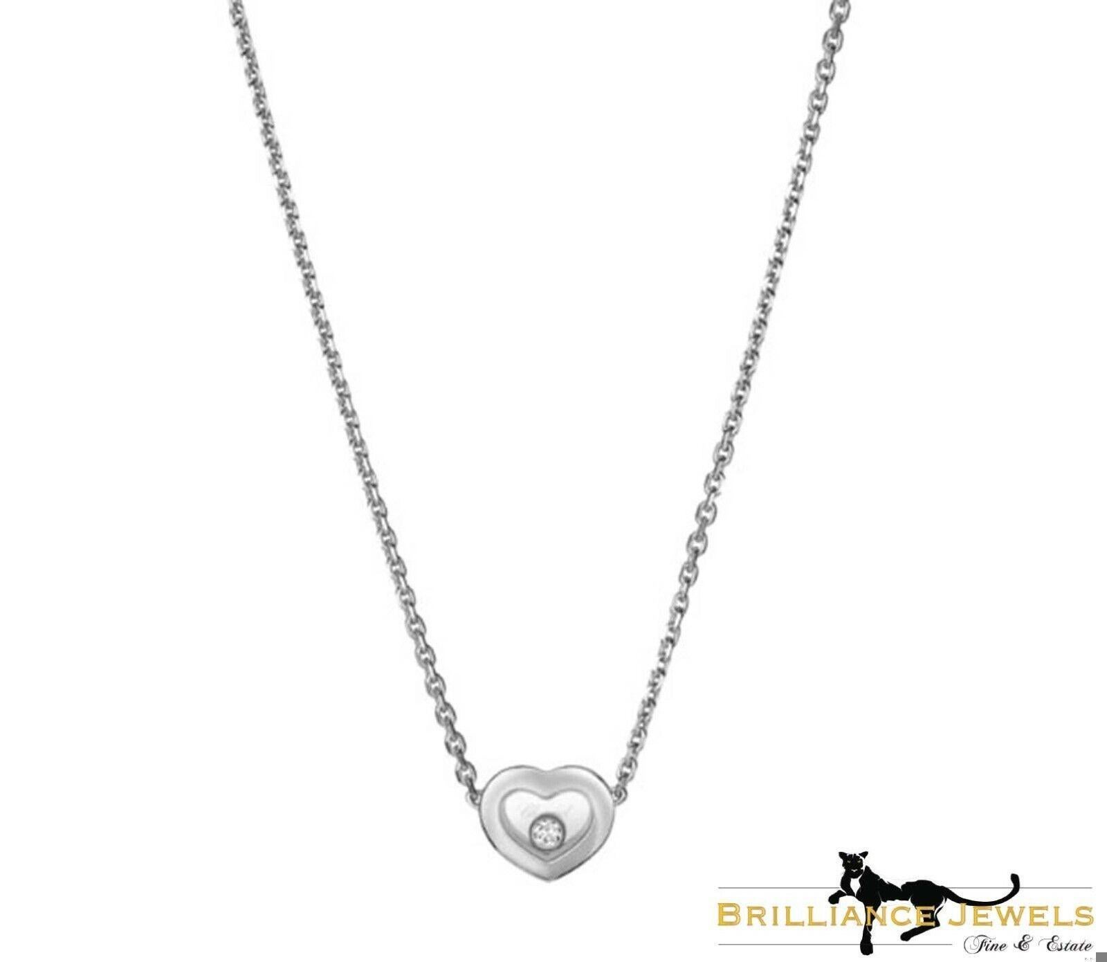 Marchio: Chopard  
Nome del modello: Happy Diamond  
Metallo: Oro bianco  
Purezza del metallo: 18k  
Pietra: 1 diamante rotondo taglio brillante  
Lunghezza della collana: 16 - 17 pollici  
Peso totale dei carati: 0,05 ct  
Punzoni: Chopard; 750 