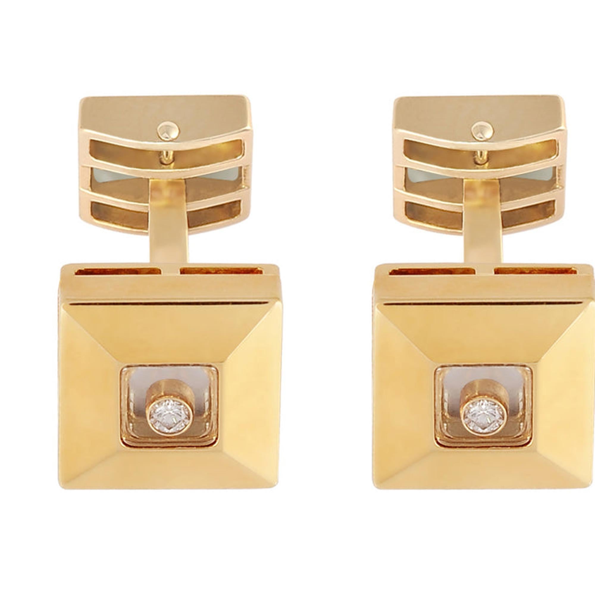 Stunning Chopard Happy square diamond cufflinks, crafted in 18K yellow gold. As they say, diamonds are happy when they are set free; this statement piece is set with a suspended playful round cut diamond weighing 0.06cttw behind a glass panel. Size